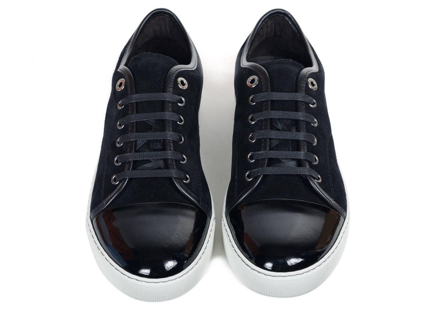 Brand New In Original Box
Retails Online and In-stores for $595
Size UK 6/ US 7 Fits True to Size

The Black Lanvin Lace Up is the perfect fall/winter essential. These low top sneakers are perfect for semi-casual events and or night events. The