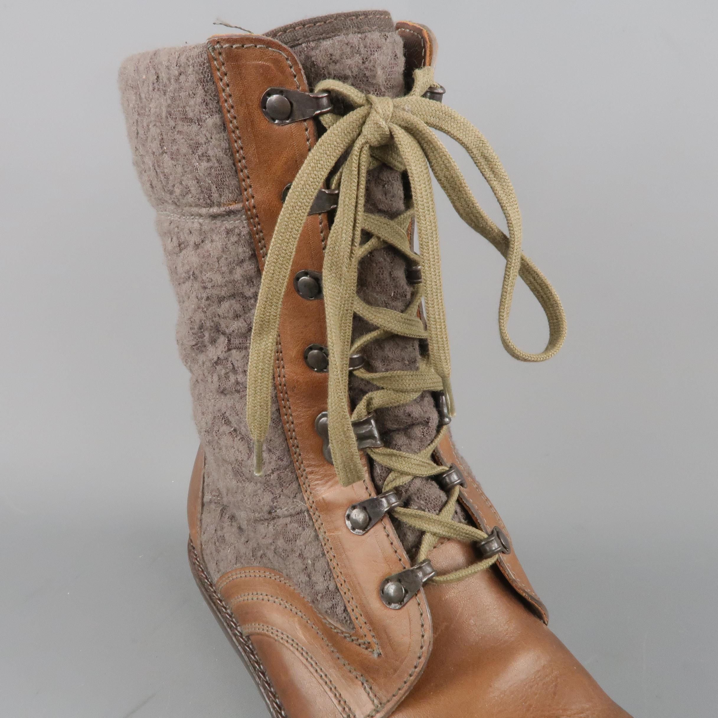 LANVIN fashion ski boots come in tan brown leather with dark metal ski hook lace up front, chunky sole, and gray textured lace shaft panel. Made in Italy.
 
Very Good Pre-Owned Condition.
Marked:
 
Measurements:
 
Length: 11.5 in.
Width: 4