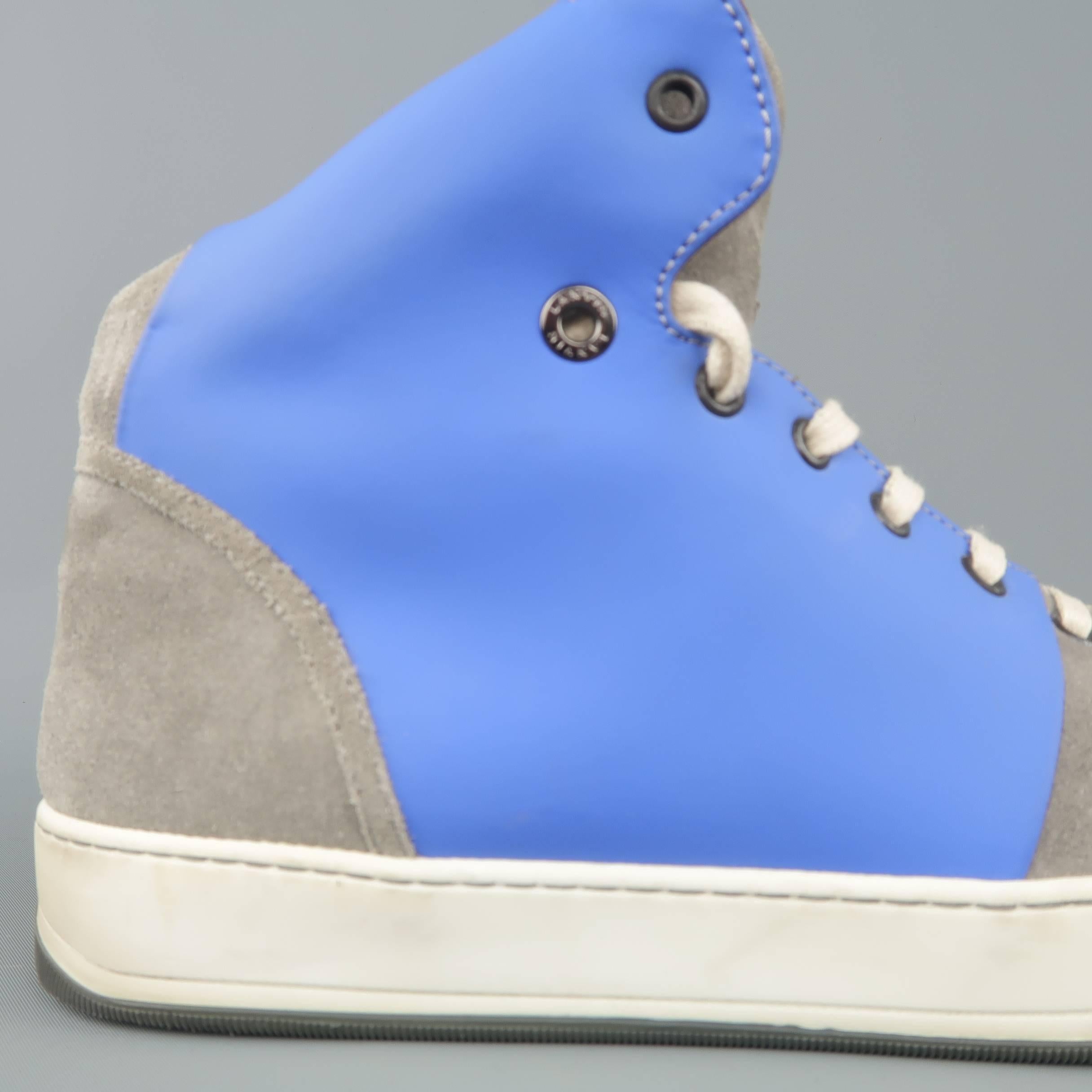 LANVIN high top sneakers come in light gray suede and features a lace up front with dark grommets, light royal blue rubber side panels, and two tone rubber sole. Min or wear. With Box. Made in Italy.
 
Good Pre-Owned Condition.
Marked: UK 7
