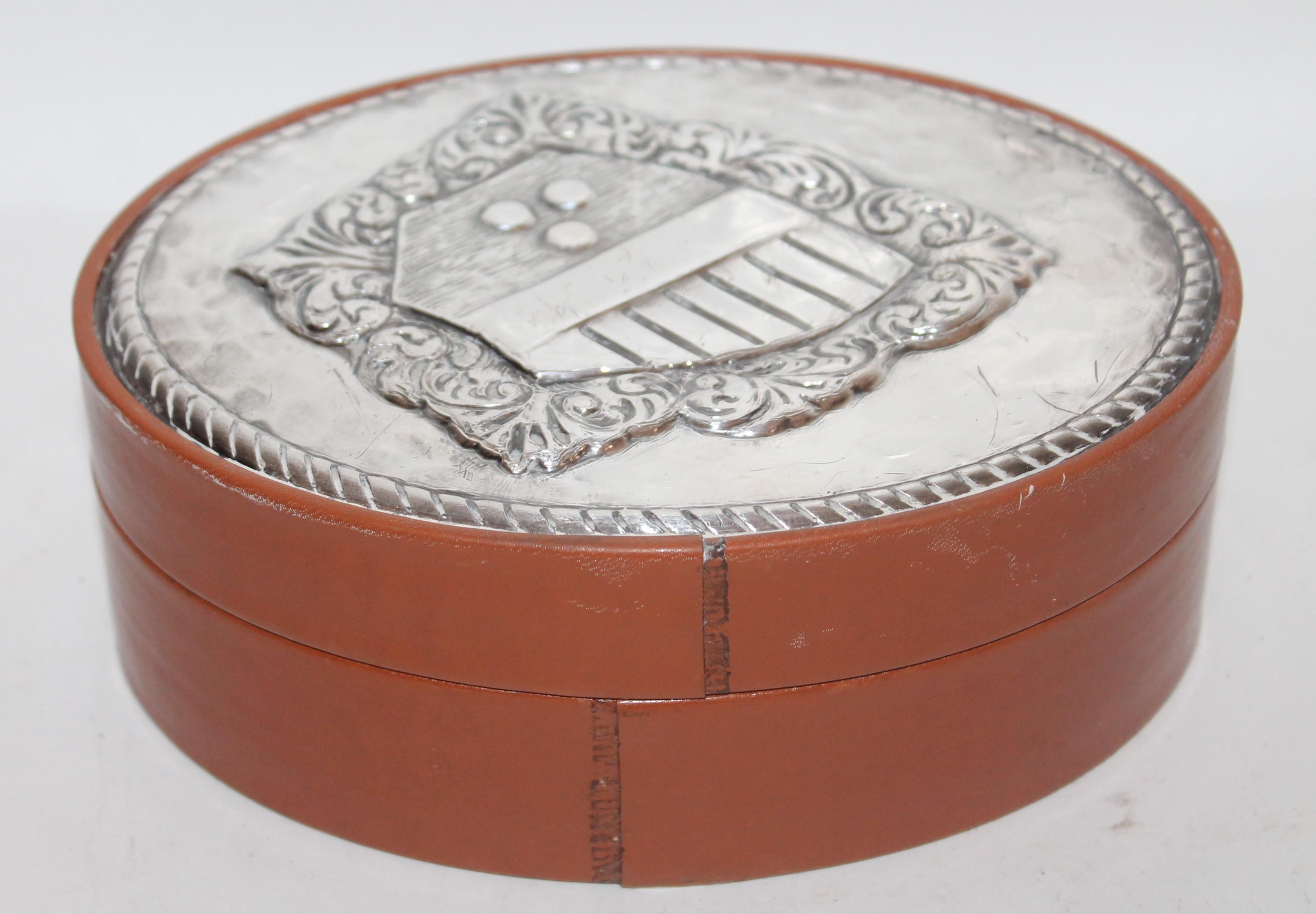This fine sterling silver laid on leather handcrafted men's jewelry box. Perfect condition.