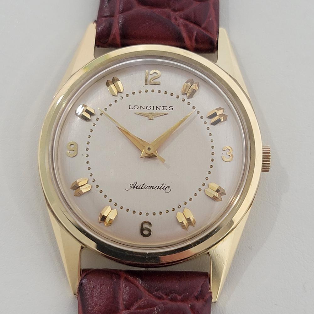 Timeless luxury, Men's 18k solid gold Longines 2310SW automatic dress watch, c.1957, in excellent working condition. Verified authentic by a master watchmaker. Longines signed dial, double baton index and Arabic 3, 6, 9 and12 hour markers, droplet