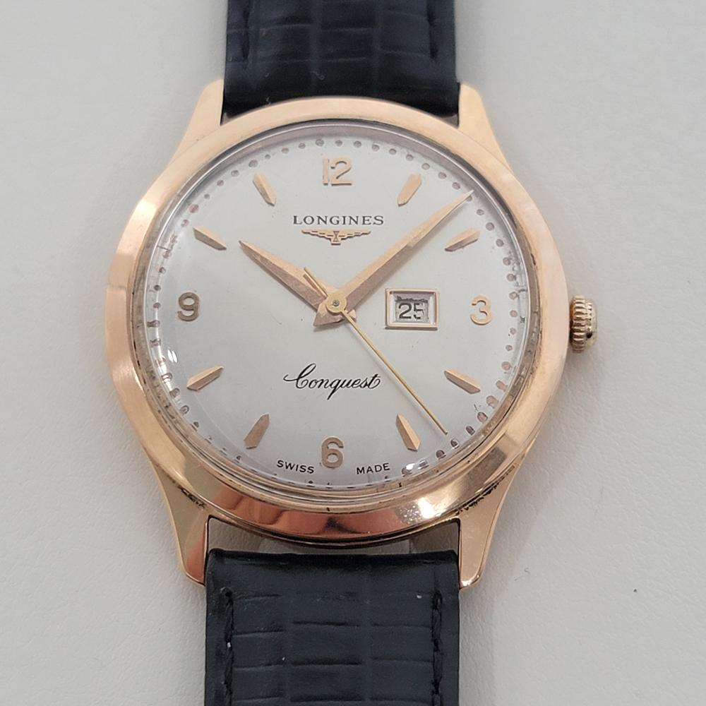 Timeless luxury, Men's 18k solid rose gold Longines Conquest manual wind date dress watch, c.1958, in excellent working condition. Verified authentic by a master watchmaker. Longines signed dial, baton index and Arabic 3, 6, 9, 12 hour markers, gilt