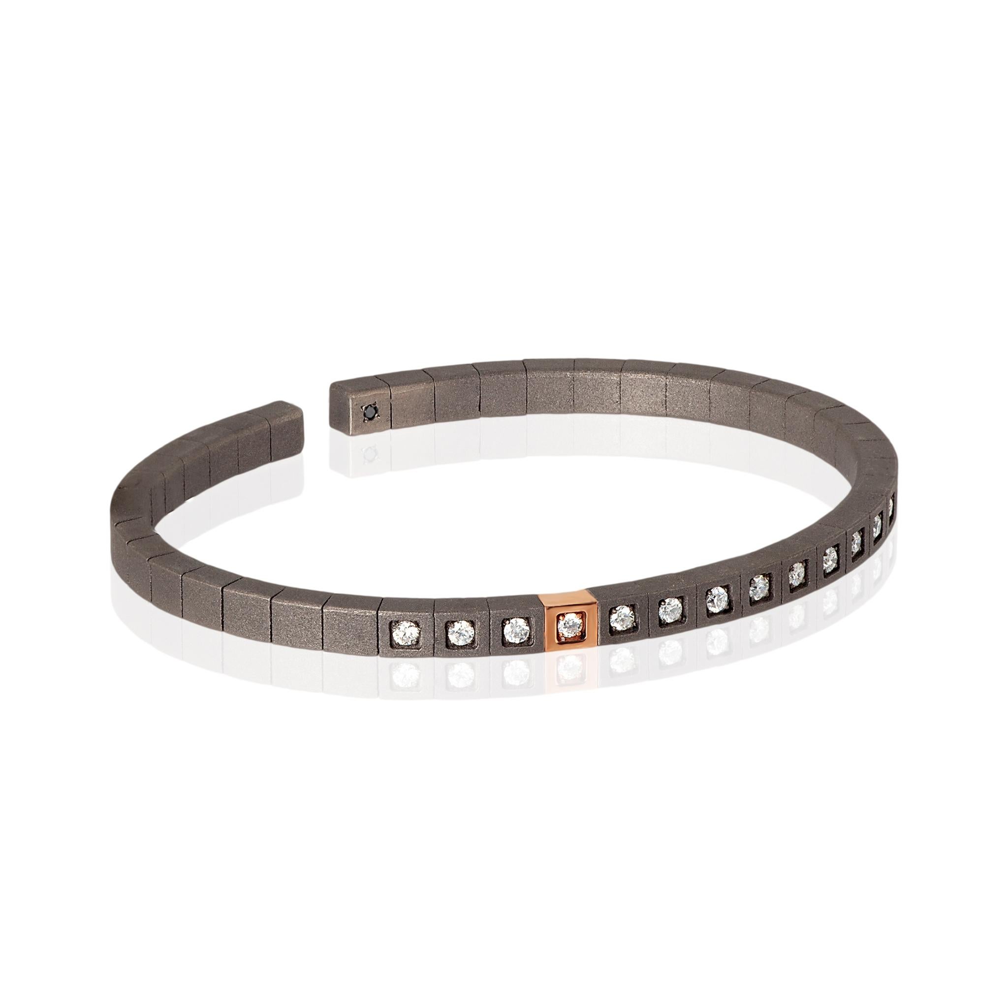Men's Loop line bracelet in titanium, 9 kt red gold and white diamonds. A precious bracelet with an innovative design in which a long series of titanium cubes are joined together by an internal spring, which gives flexibility to the entire