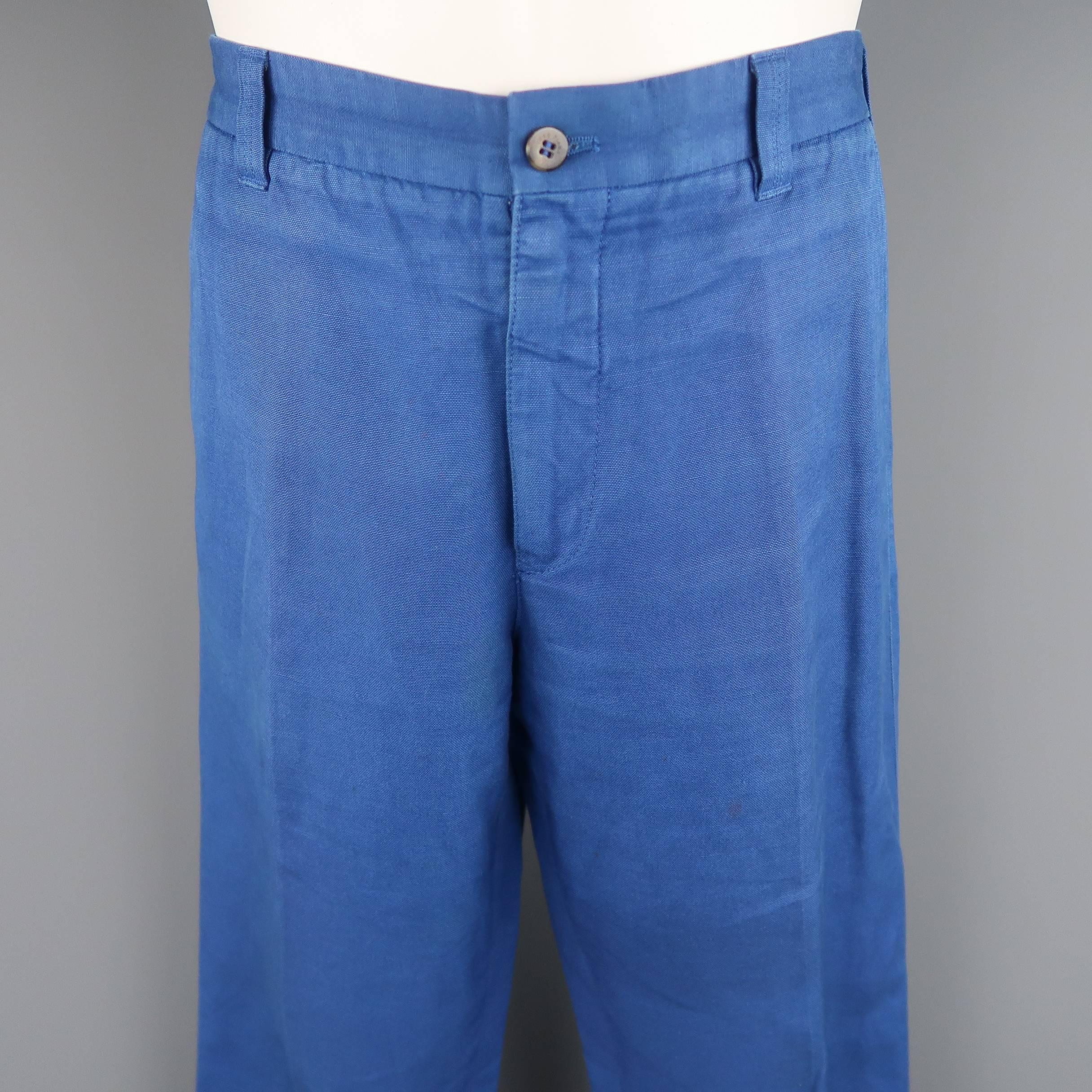LORO PIANA chinos come in royal blue cotton canvas with a classic fit leg. Fading throughout. As-is. Made in Italy.
 
Fair Pre-Owned Condition.
Marked: IT 50
 
Measurements:
 
Waist: 35 in.
Rise: 10.5 in.
Inseam: 33 in.
