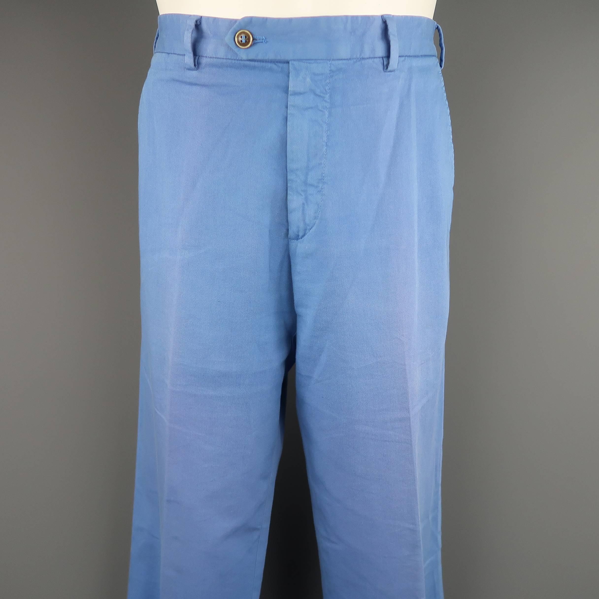 LORO PIANA chino pants come in sky blue cotton canvas with a classic fit. Discoloration throughout. As-is. Made in Italy.
 
Fair Pre-Owned Condition.
Marked: IT 50
 
Measurements:
 
Waist: 34 in.
Rise: 10 in.
Inseam: 34 in.
