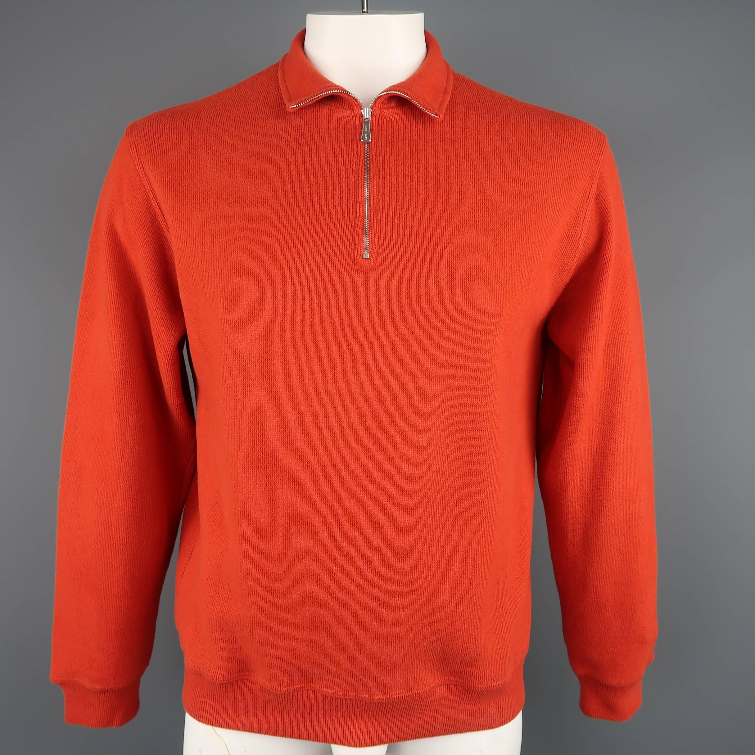 LORO PIANA pullover comes in orange ribbed jersey knit with a silver tone half zip mock neck. Wear throughout. As-is.  Made in Italy.
 
Fair Pre-Owned Condition.
Marked: IT 52
 
Measurements:
 
Shoulder: 19 in.
Chest: 46 in.
Sleeve: 25 in.
Length: