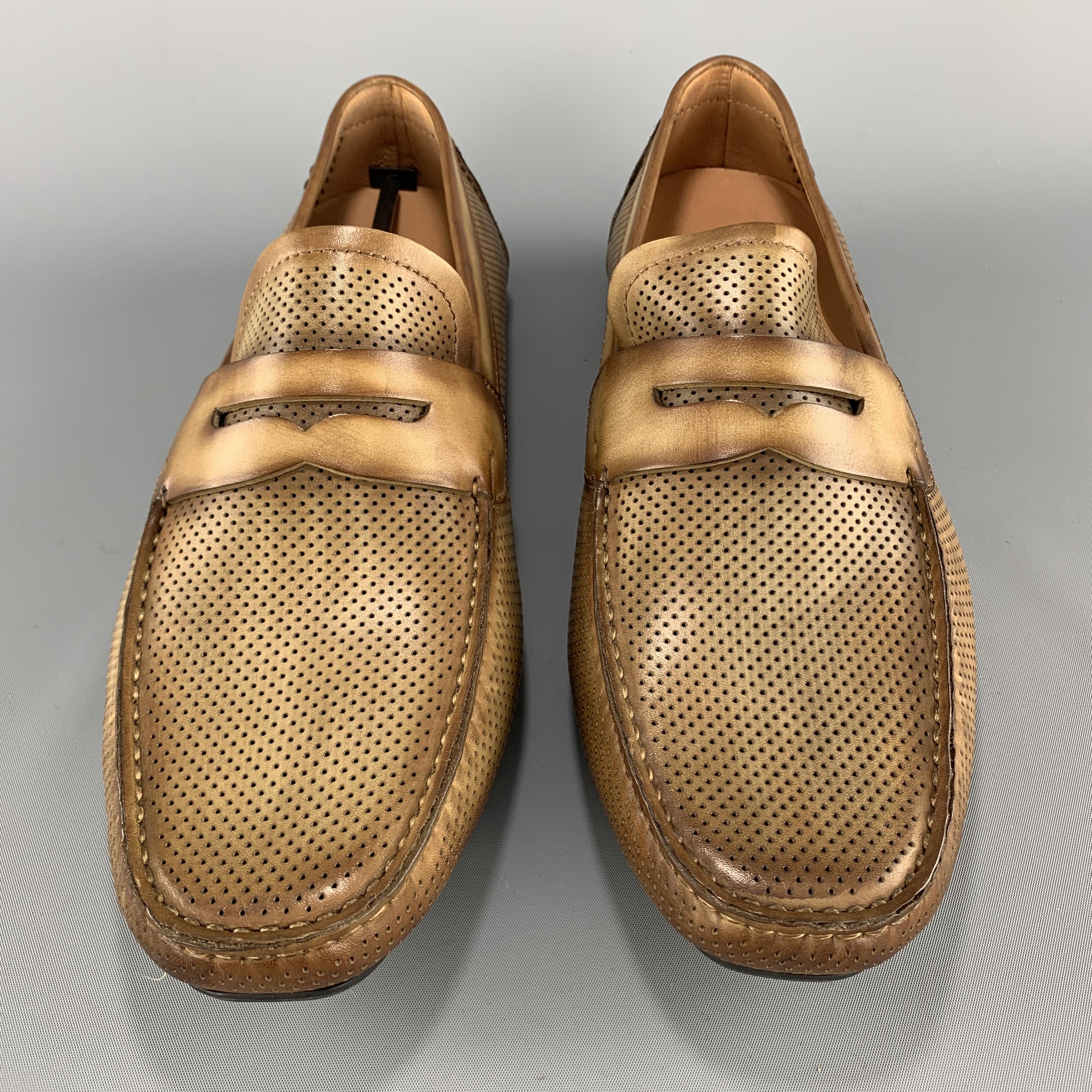 MAGNANNI loafers come in antique effect beige perforated leather with a driver sole. Made in Spain.

New in Box.
Marked: 10.5

Outsole: 12.25 x 4.25 in.