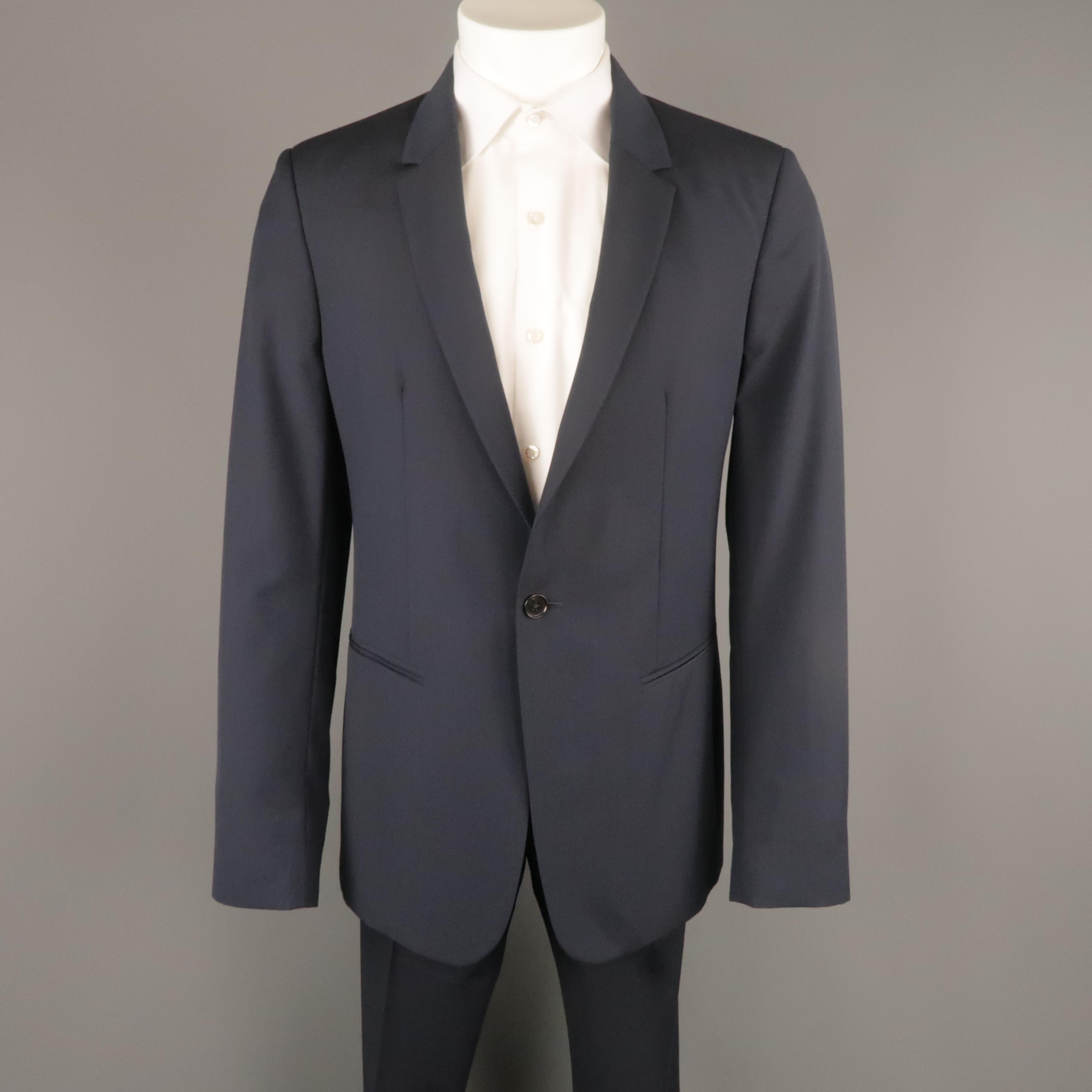 MAISON MARTIN MARGIELA suit comes in navy wool and includes a single breasted,  one button, notch lapel sport coat with mock button cuffs and matching flat front trousers. Made in Italy.
 
Excellent Pre-Owned Condition.
Marked: IT 48

