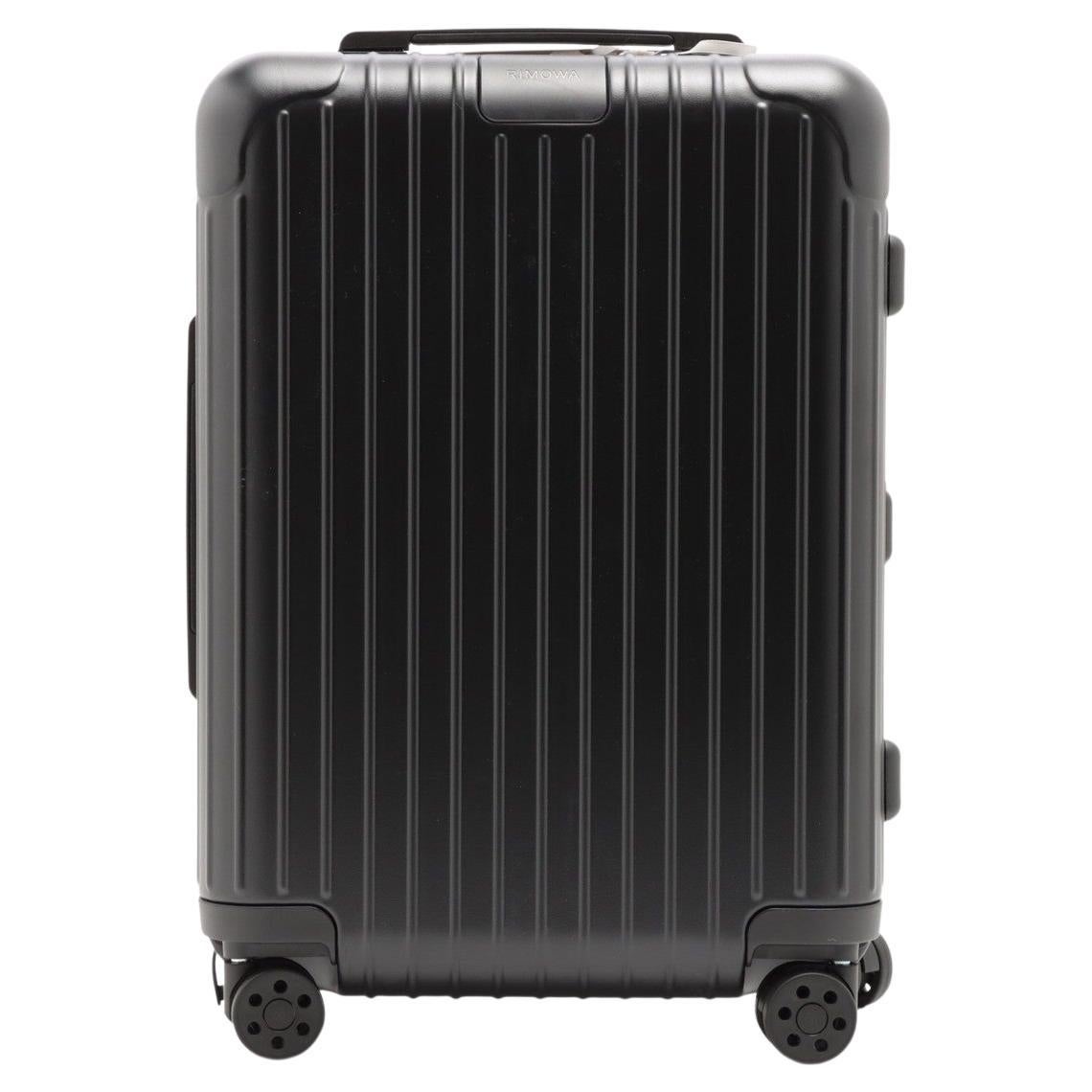 Men's matte black polycarbonate Rimowa suitcase with tonal hardware For