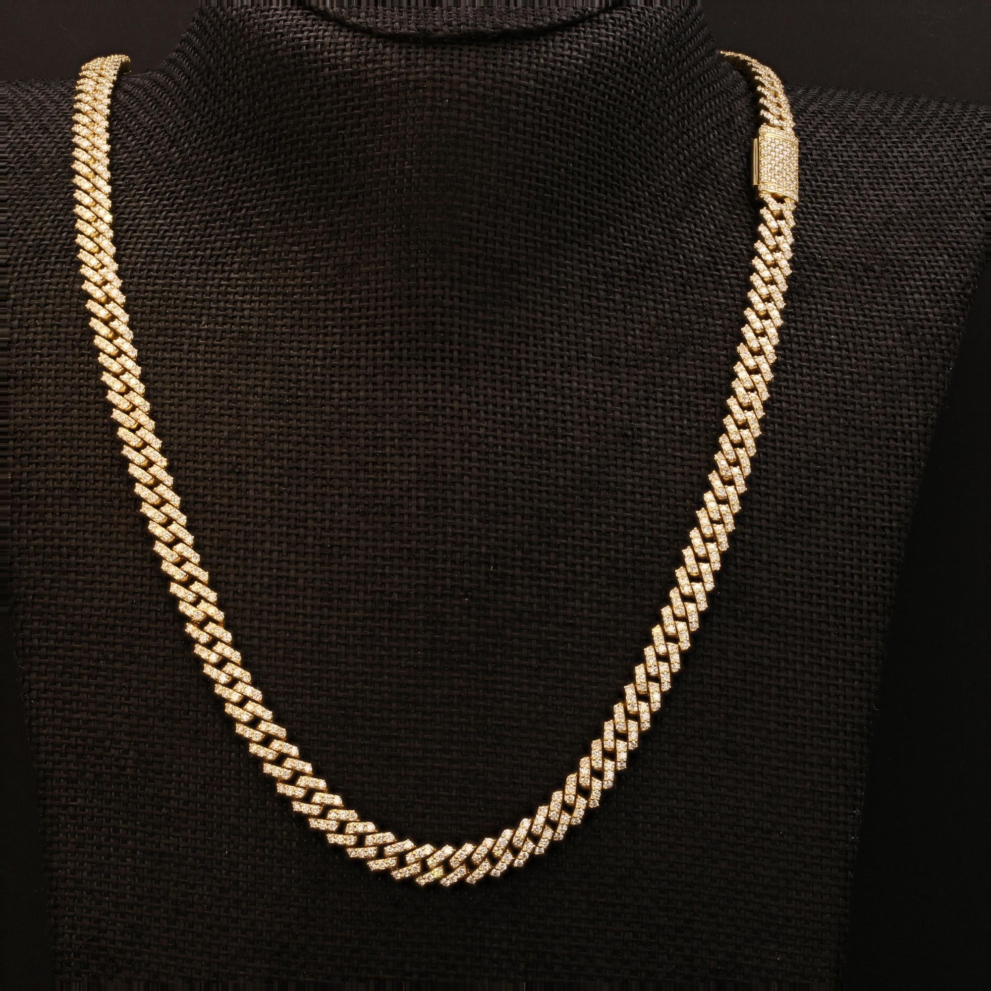 Elevate your style with the luxurious sophistication of this diamond Miami cuban necklace, offered by Alex & Co. Handcrafted in solid 10 karat yellow gold with precision and unparalleled attention to detail. Each link is 2 row prong set with round