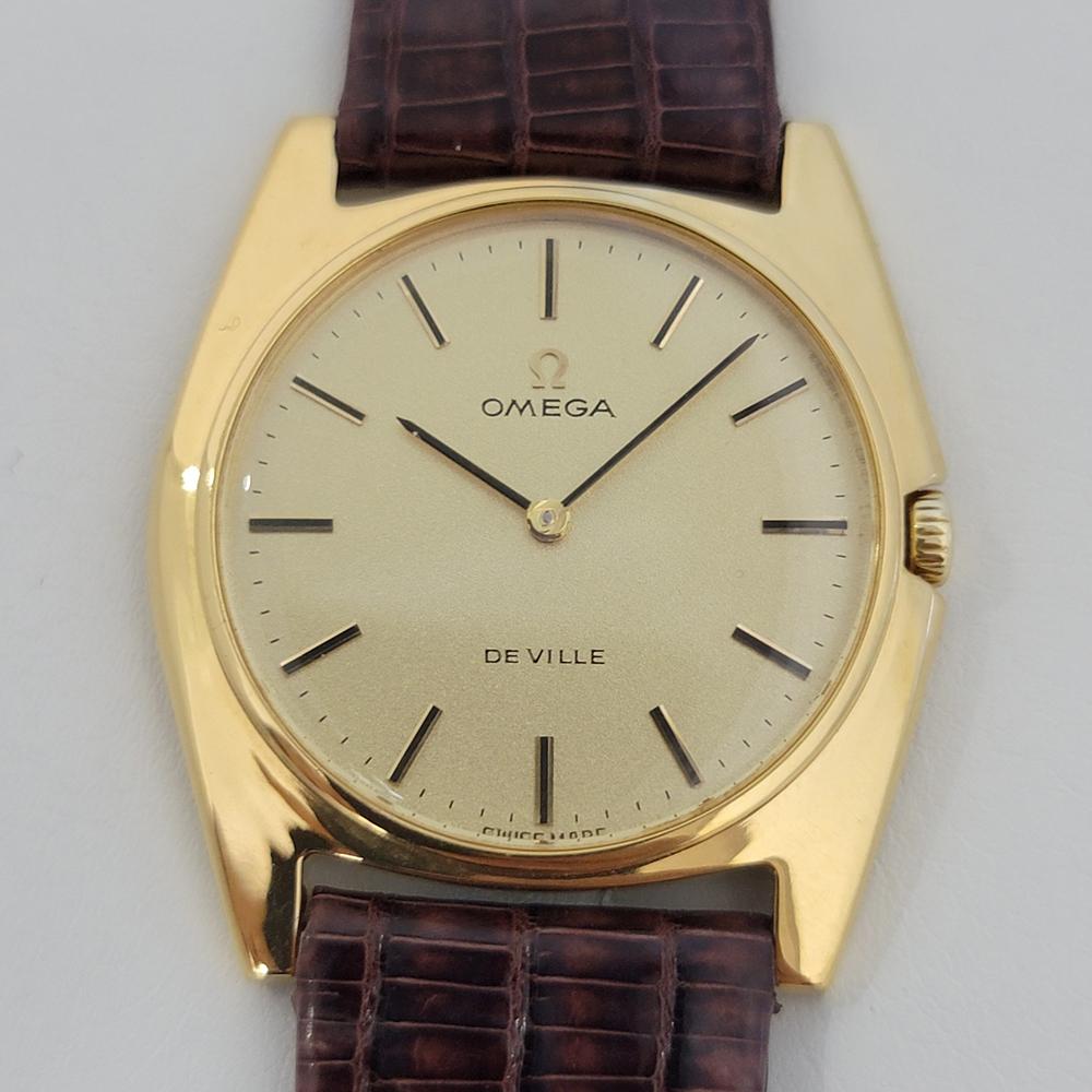Timeless classic, Men's midsize Omega DeVille Ref.111 098 gold-capped hand-wind dress watch, c.1960s. Verified authentic by a master watchmaker. Gorgeous Omega signed dial, applied indice hour markers, black minute and hour hands, hands and dial in