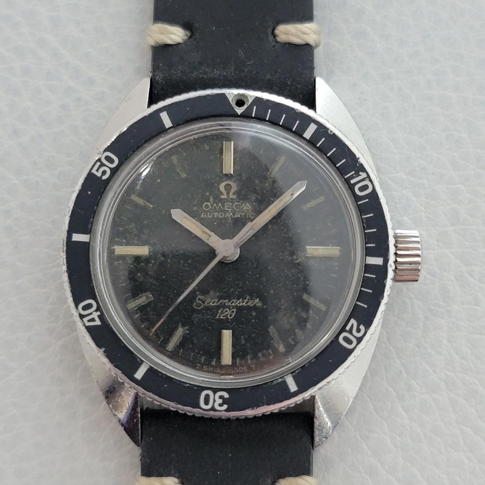 Collectable vintage classic, Men's midsize Omega 14k rose gold military style dress watch, c.1930s. Verified authentic by a master watchmaker. Gorgeous Omega signed black dial, white baton and Roman numeral hour markers, silver minute and hour