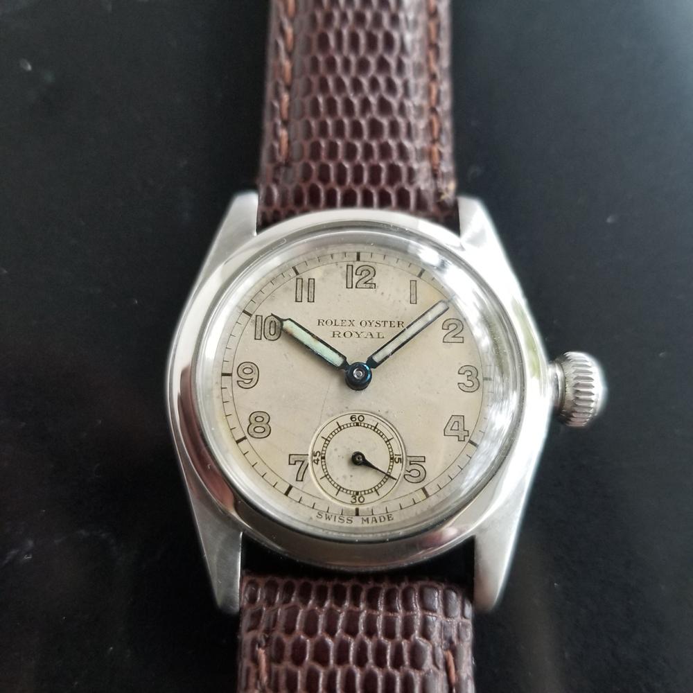 Timeless classic, Men's midsize Rolex Oyster Royal ref.2280 hand-wind dress watch, c.1940s. Verified authentic by a master watchmaker. Gorgeous Rolex signed vintage dial, some natural discoloration on dial, Arabic numeral hour markers, lumed minute