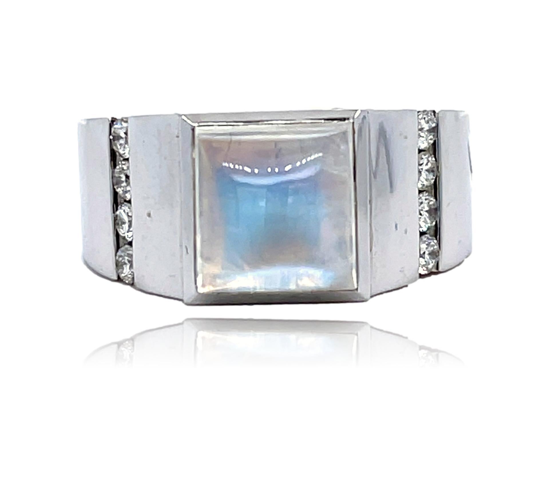 This unique Men's ring has a vibrant Moonstone center with brilliant cut diamonds along both sides and is set in 14K white gold. It comes in a beautiful box ready for the perfect gift!

14KW:            9.0 gms
Moonstone wt:    6.06 cts
Diamond:    