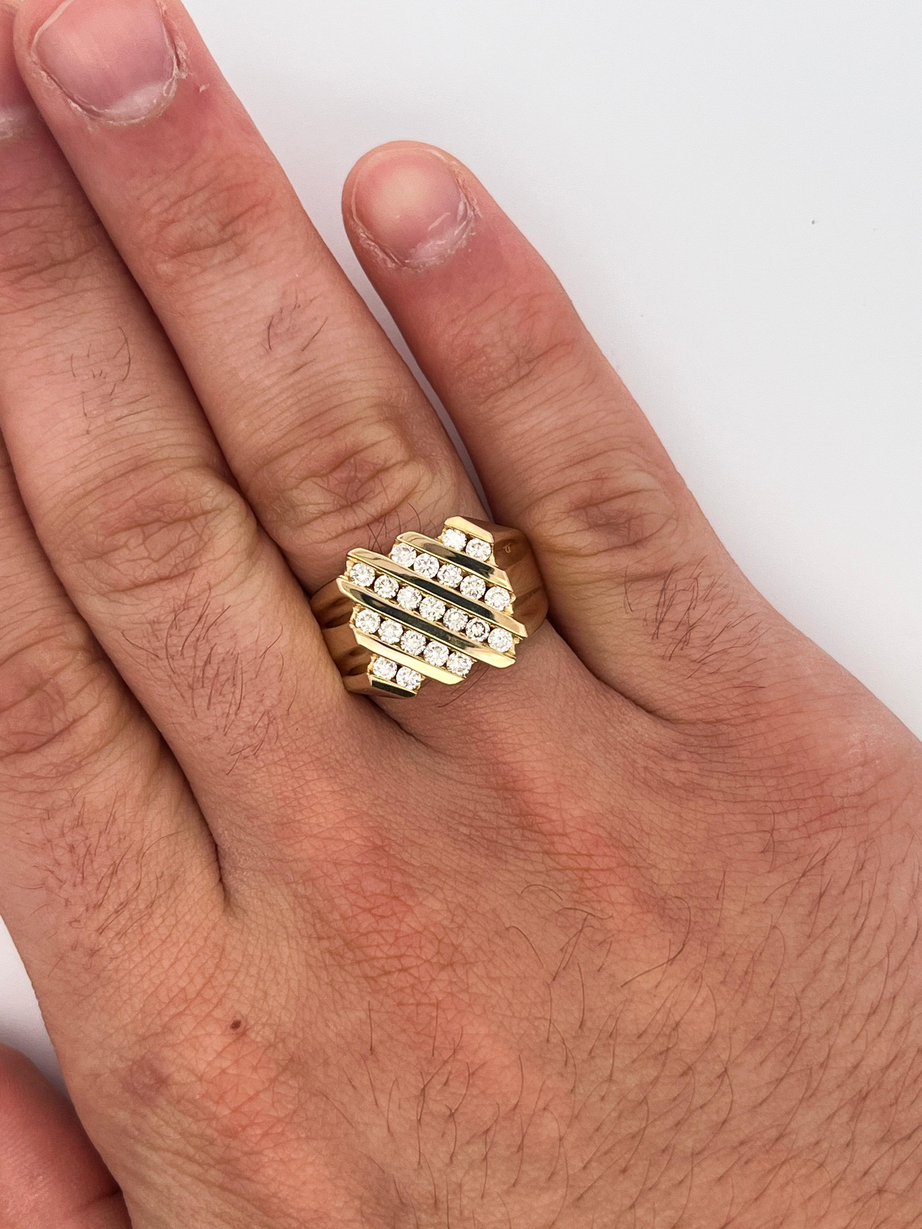 Natural diamond men's ring, set in a stunning textured and curved pattern 14k solid yellow gold. Fixed with a flat face that sits beautifully on the finger.

The diamonds are excellent quality. Superbly white and eye-clean. Expertly channel set in 5