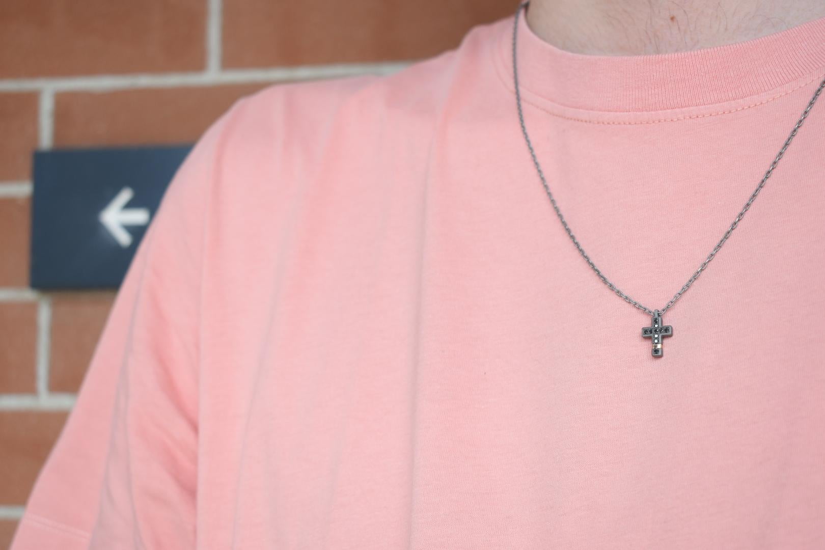 red and black cross necklace