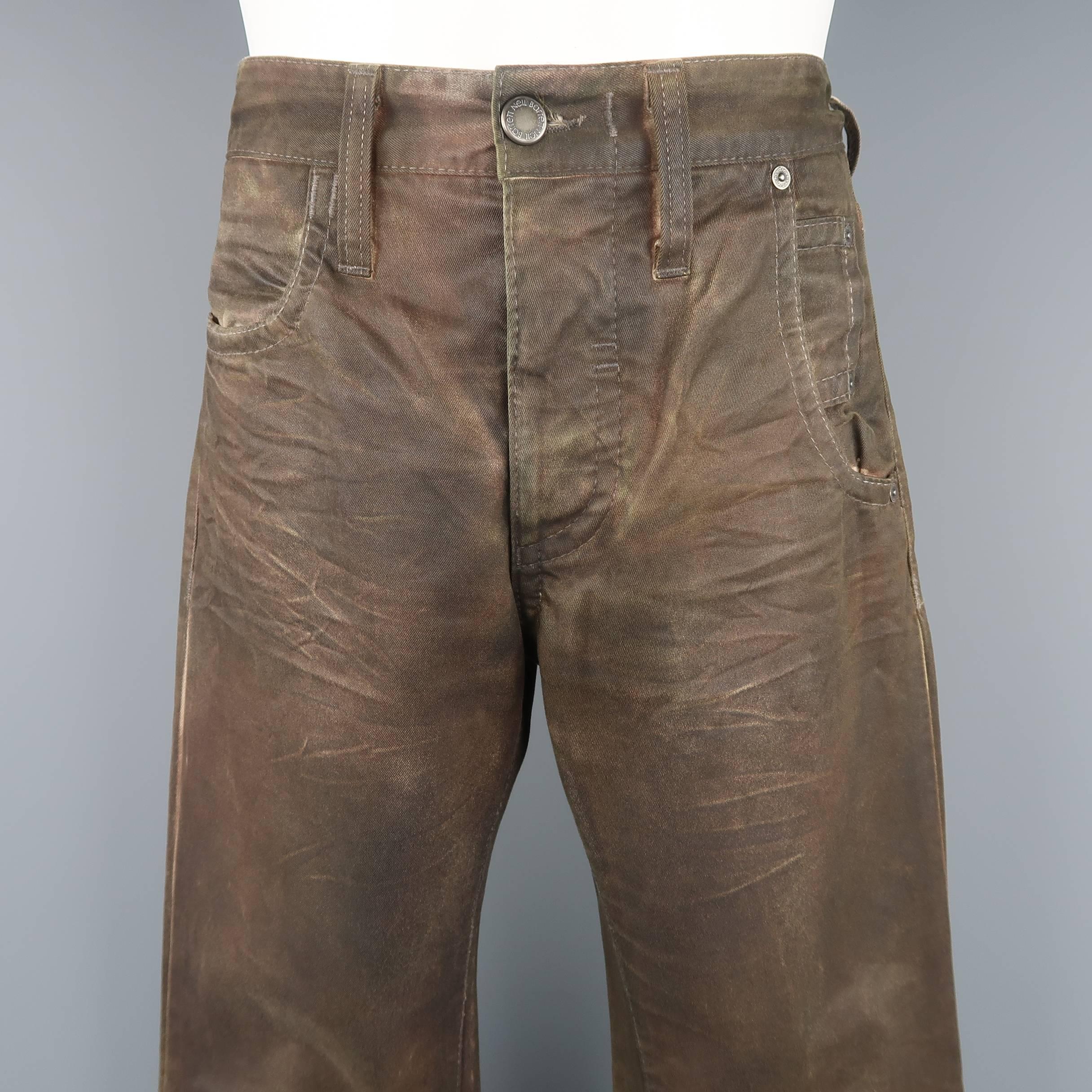 NEIL BARRETT jeans come in cotton twill denim with all over distressed brown and olive paint. Circa 2004. Made in Italy.
 
Good Pre-Owned Condition.
Marked: 31
 
Measurements:
 
Waist: 31 in.
Rise: 10.5 in.
Inseam: 32 in.
