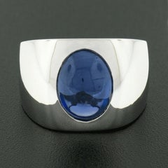 Herrenring, Neu, Platin, Gubelin, ovaler Cabochon-Saphir, Solitär, polierter breiter Ring