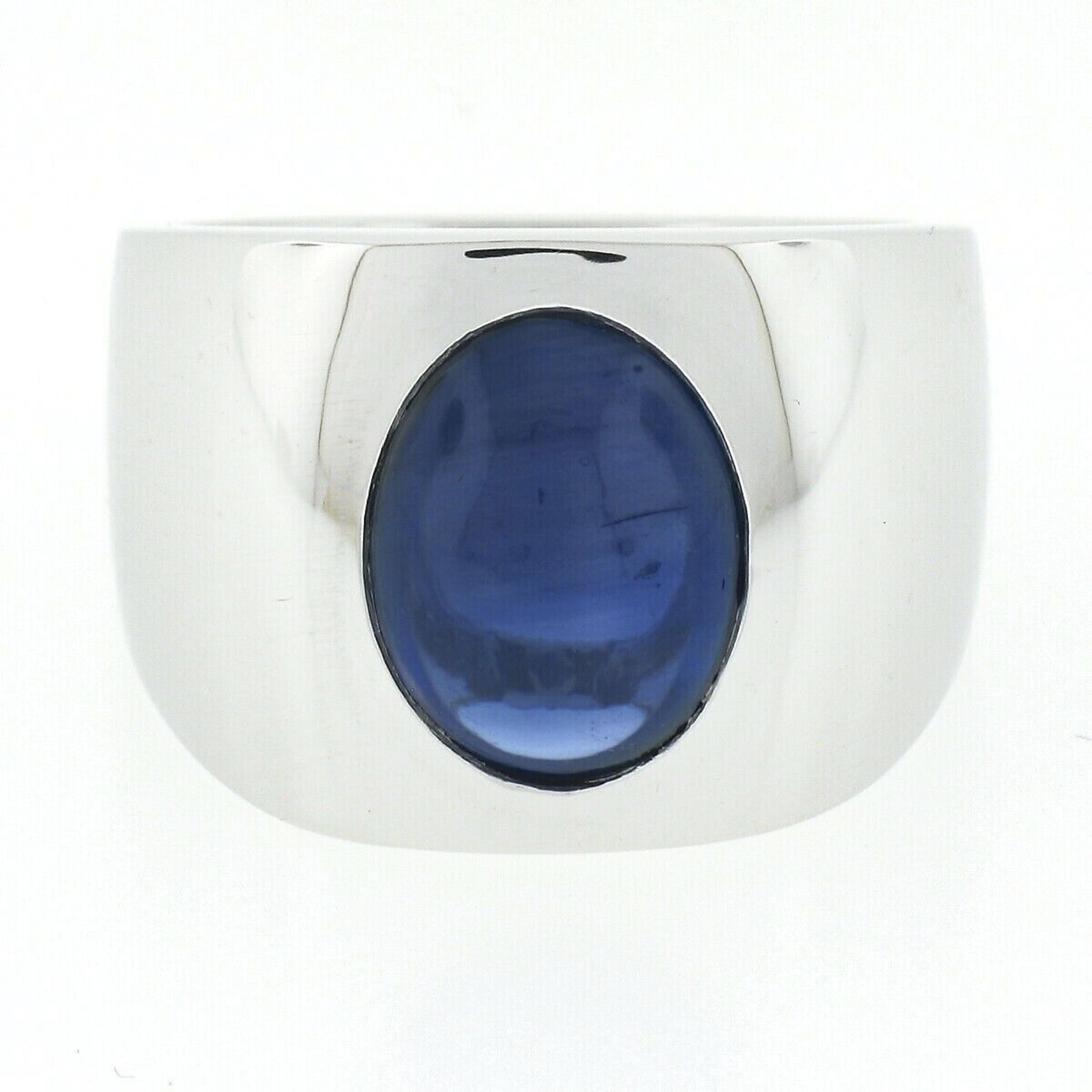 Men's New Platinum Gubelin Oval Cabochon Sapphire Solitaire Polished Wide Ring In New Condition In Montclair, NJ