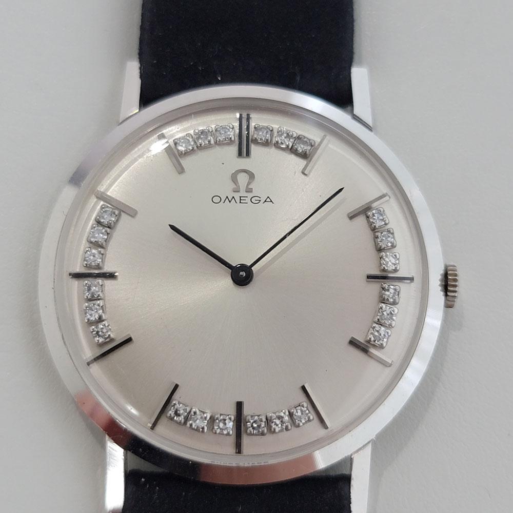 Timeless classic, Men's solid 14k white gold Omega dress watch with gorgeous diamond dial, c.1968, all original, with original Omega box. Verified authentic by a master watchmaker. Gorgeous Omega signed silver dial, applied baton hour markers,
