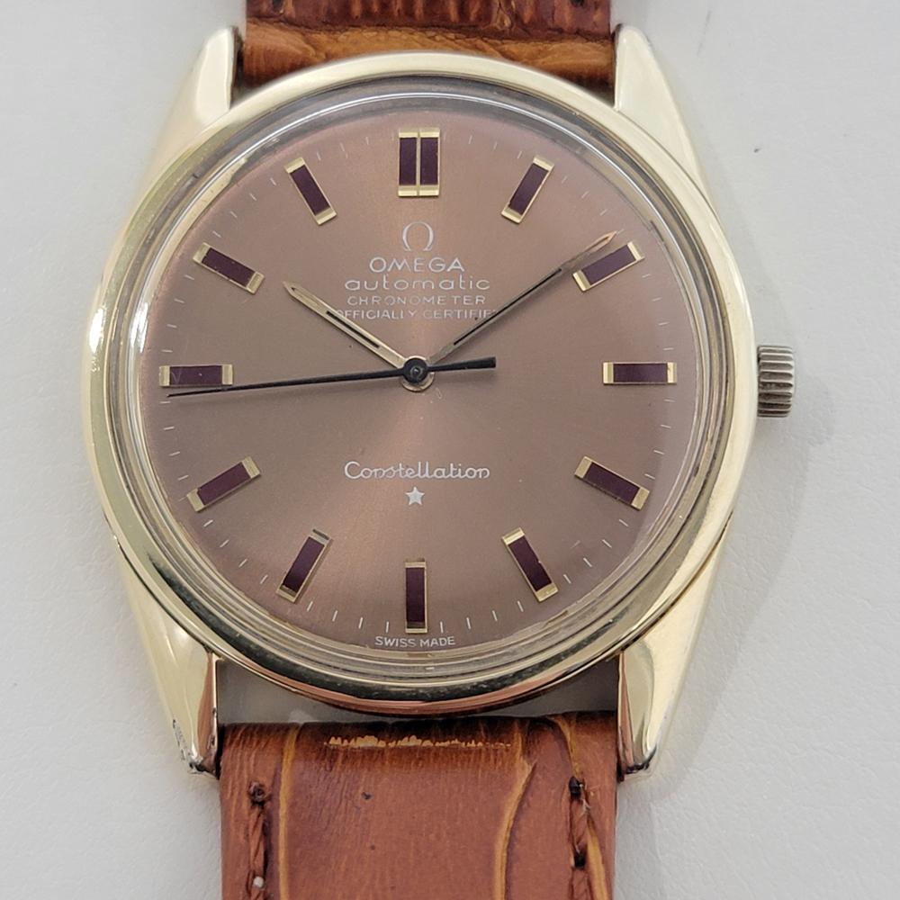 Elegant classic, Men's gold-capped Omega Constellation automatic, c.1966, in excellent working condition. Verified authentic by a master watchmaker. Gorgeous Omega signed dial, applied baton index hour markers, gilt minute and hour hands, sweeping