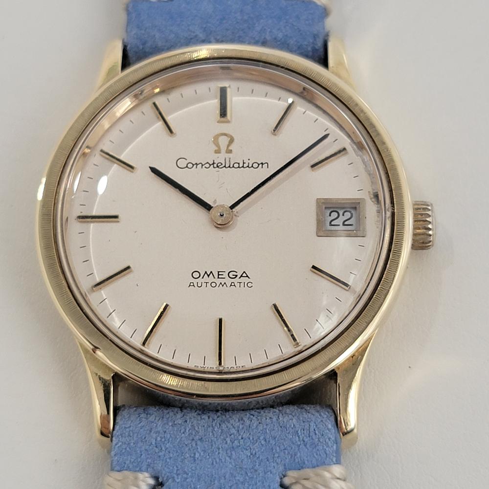 Luxurious classic Men's solid 18k gold Omega Constellation Ref. 166.052 date automatic, c.1969, in excellent vintage, working condition. Verified authentic by a master watchmaker. Omega signed gold dial, applied baton hour markers, gilt minute and