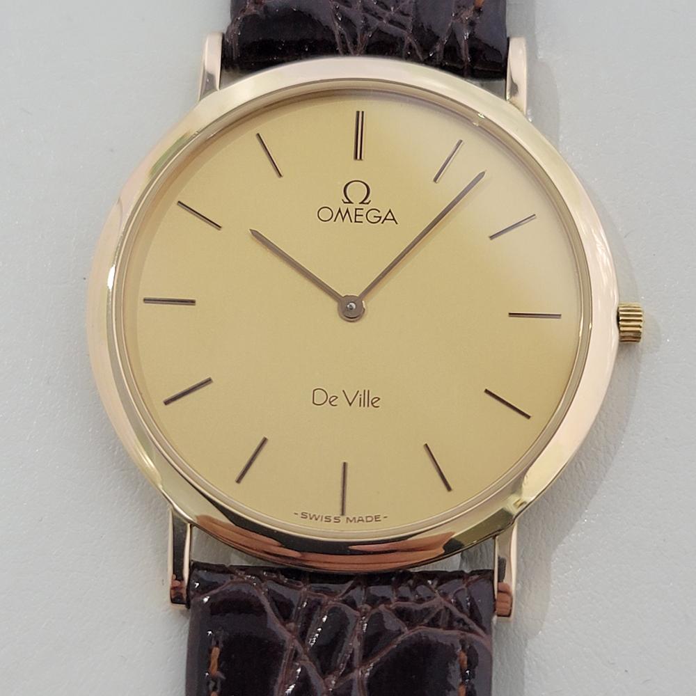 Elegant luxury, Men's 18k gold-capped Omega DeVille ultra thin dress watch watch, c.1984, in excellent working condition. Verified authentic by a master watchmaker. Omega signed dial, applied baton index hour markers, gilt minute and hour hands,