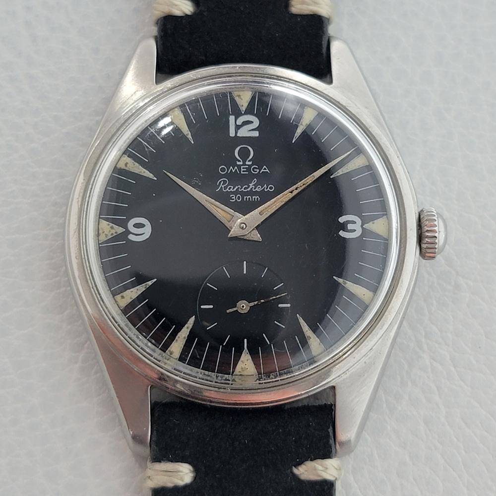 Rare vintage classic, Men's Omega Ranchero manual wind, c.1958. Verified authentic by a master watchmaker. Gorgeous Omega signed black dial, applied indice hour markers with Arabic numeral 3, 9, and 12, lumed silver minute and hour hands, subdial