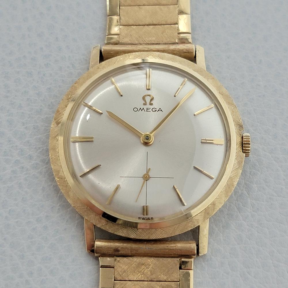 Timeless classic, Men's Omega 14k solid gold US Collection hand-wind cocktail dress watch, c.1960s, all original. Verified authentic by a master watchmaker. Gorgeous Omega signed dial, applied indice hour markers, gold minute and hour hands,