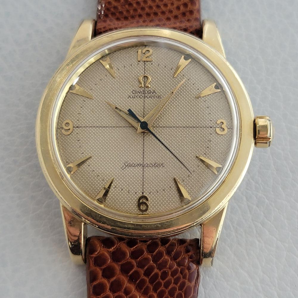 Timeless classic, Men's Omega Seamaster gold-capped bumper automatic dress watch, c.1950s, all original. Verified authentic by a master watchmaker. Gorgeous Omega signed honeycomb quadrant dial, applied dagger indice hour markers with Arabic numeral