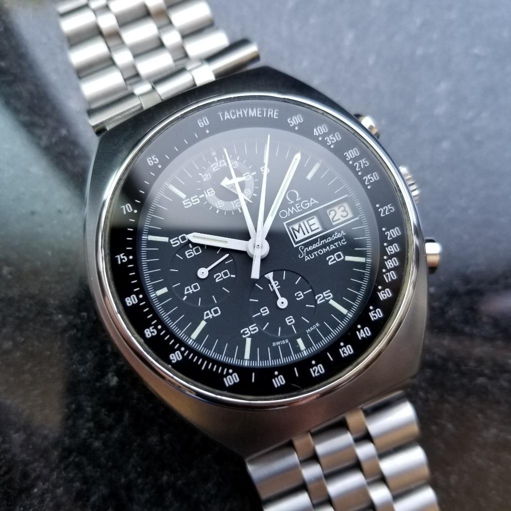 Iconic classic, Men's Omega Speedmaster Mark 4.5 automatic 42mm, c.1980s, all original. Verified authentic by a master watchmaker. Gorgeous Omega signed black chronograph dial, applied indice hour markers, white minute and hour hands, central