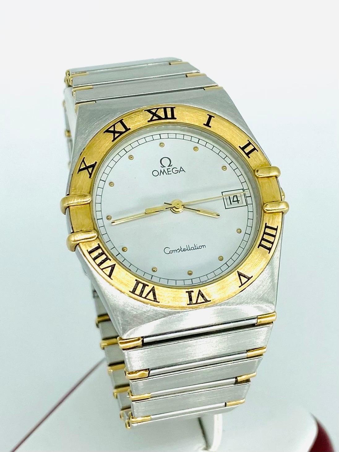 Men’s Omega 18k and Stainless Steel Date Constellation 34mm Watch. It is quartz movement and is a men's size watch. The watch is a vintage Omega. Will fit wrist of up to 6.75 inches.