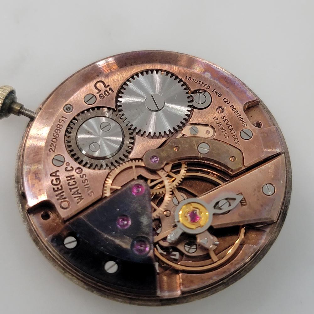 Omega collection américaine P6587 or 14 carats à remontage manuel des années 1960, vintage suisse RA468 en vente 6