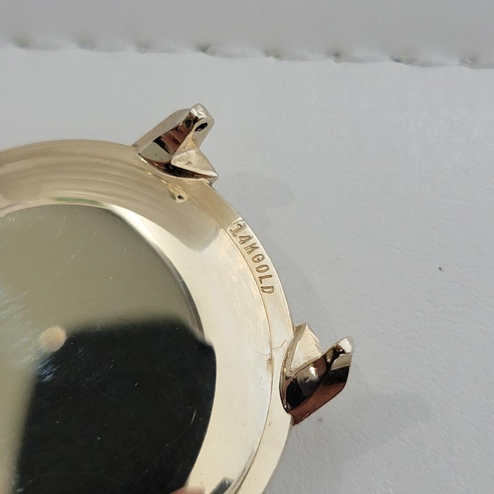 Omega collection américaine P6587 or 14 carats à remontage manuel des années 1960, vintage suisse RA468 en vente 8
