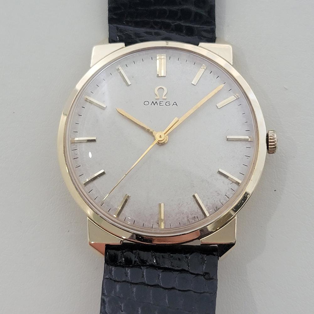 Vintage classique, Omega US Collection C pour homme en or massif 14k, c.1965, en excellent état de marche. Vérifié authentique par un maître horloger. Magnifique cadran signé Omega, index bâtons appliqués, aiguilles des minutes et des heures dorées,