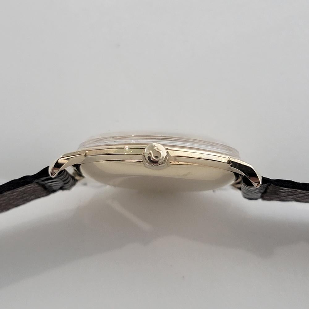 Omega collection américaine P6587 or 14 carats à remontage manuel des années 1960, vintage suisse RA468 en vente 4