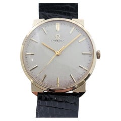Omega collection américaine P6587 or 14 carats à remontage manuel des années 1960, vintage suisse RA468