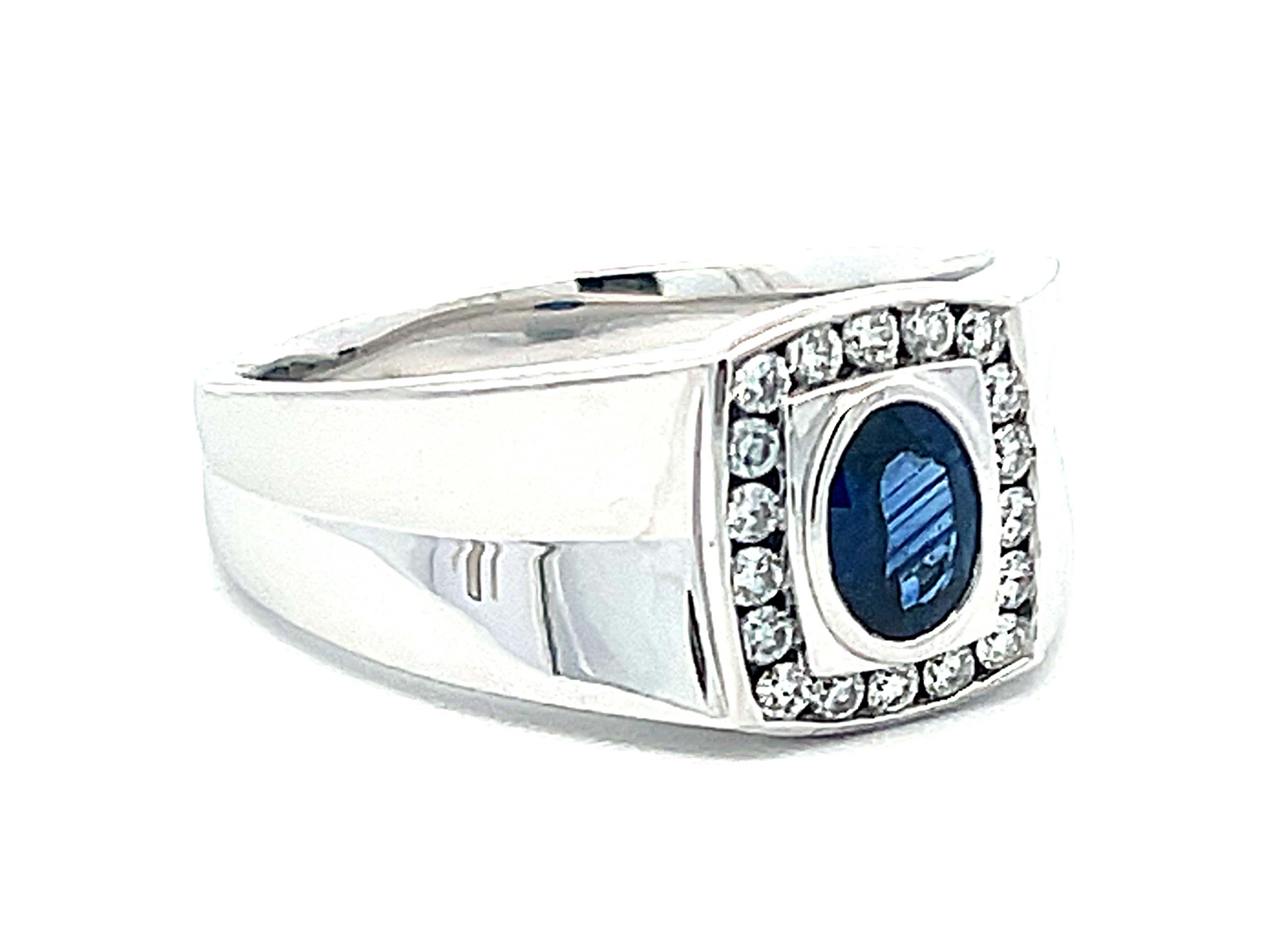 Brilliant Cut Mens Oval Sapphire Center and Diamond Halo Ring in 14k White Gold For Sale