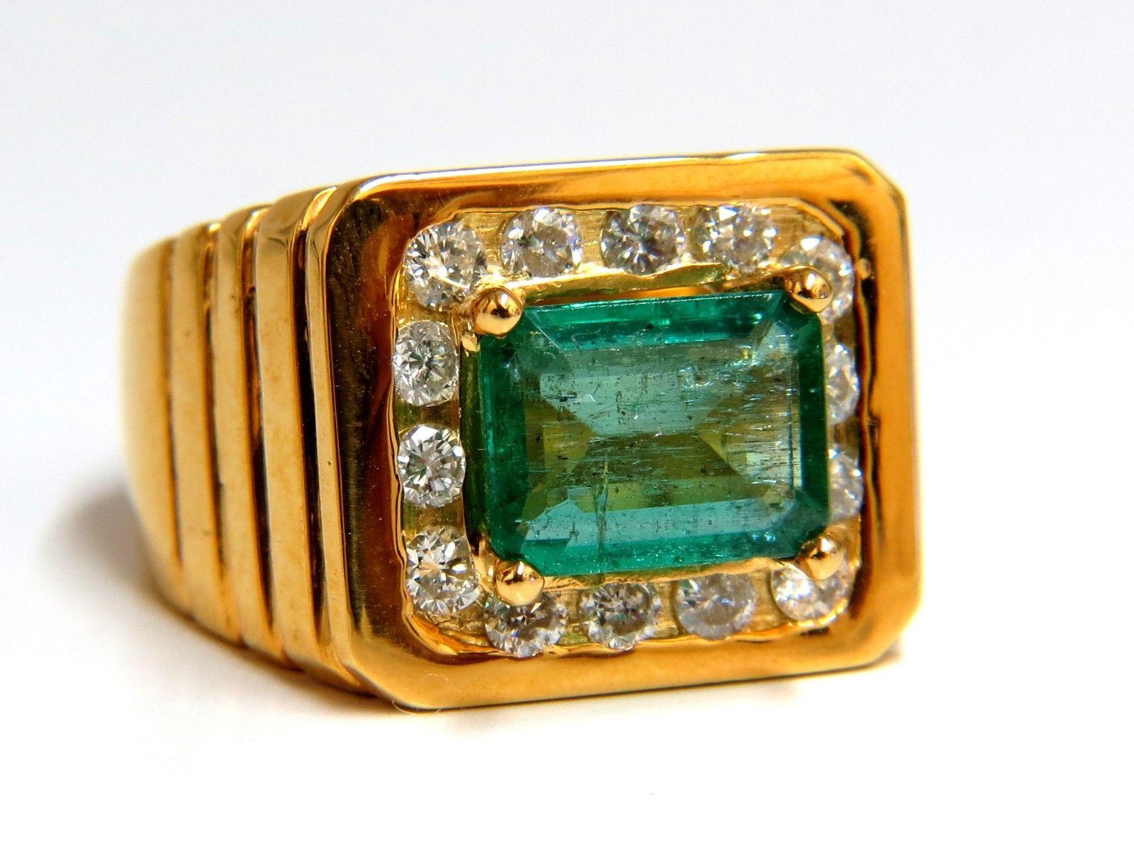 Mens Emerald Pinky Importance

2.40ct. natural emerald ring

Emerald cut, Brilliant

Clean clarity & transparent.

9.5 x 7.2mm

Round Side diamonds: .80ct.

I-color & Vs-2 clarity.

14kt. yellow gold

16 grams

Ring Current size: 7.5

deck of ring: