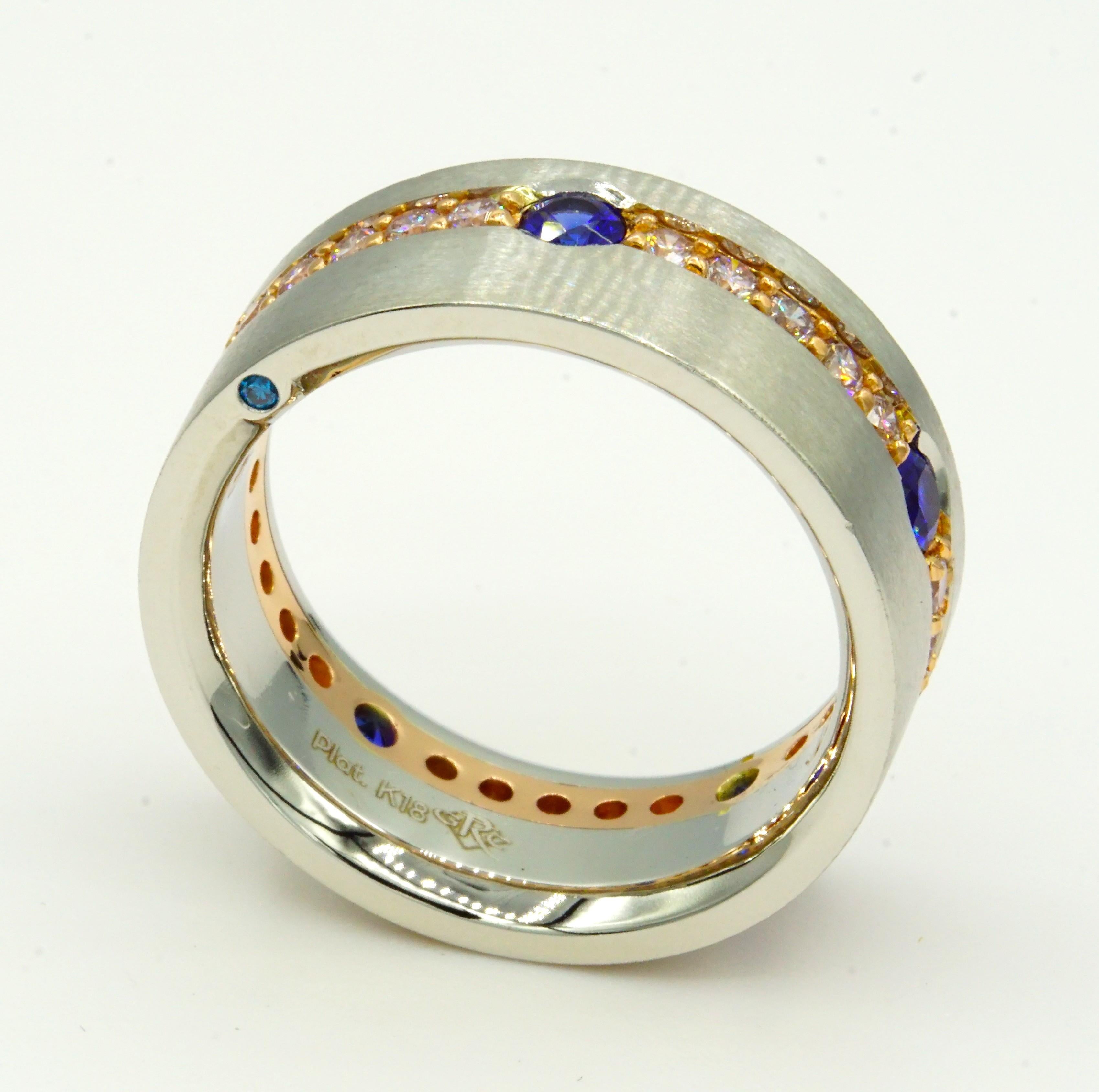 Men's Platinum 18kt Rose Gold Ceylon Sapphire, Natural Pink Diamond  Band Custom Made-To-Order

Featured Description:
This stunning men's wedding band features a combination of platinum and 18kt rose gold. It is adorned with thirty (30) natural pink
