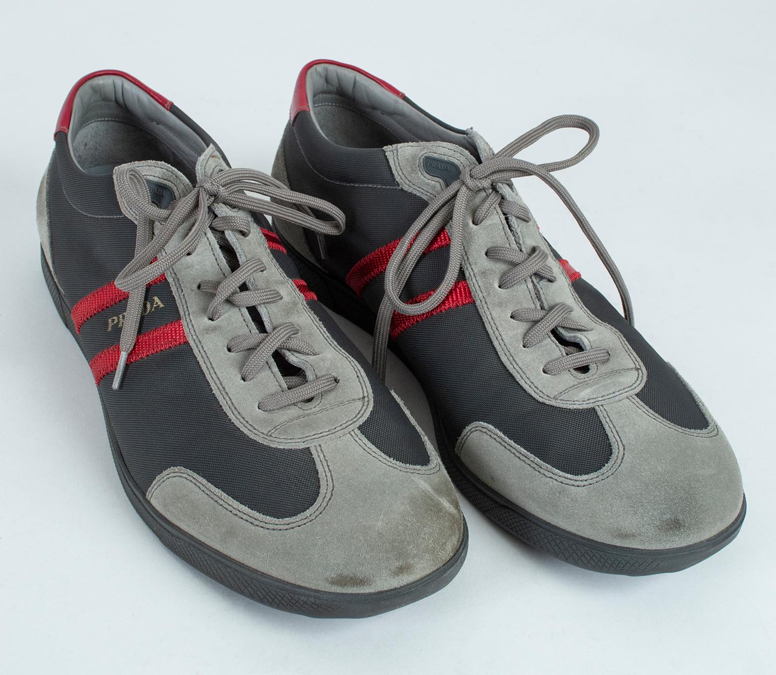 The ultimate in casual luxury, these low top sneakers offer comfort, practicality and loads of style. Sturdy but lightweight, their retro styling and color scheme make them the perfect weekend shoe.

Gray suede low top sneakers with canvas inset and