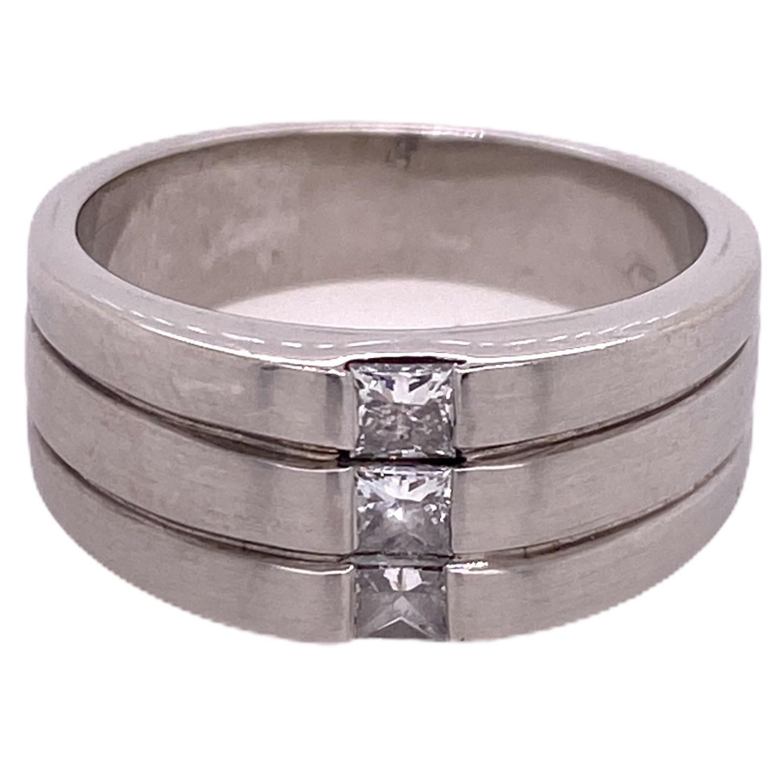 Men's diamond band ring fashioned in 14 karat white gold. The band features 3 princess cut diamonds weighing .45 carat total weight and graded I color and SI clarity.  The band measures 10mm in width and is currently size 11 (can be sized). 
