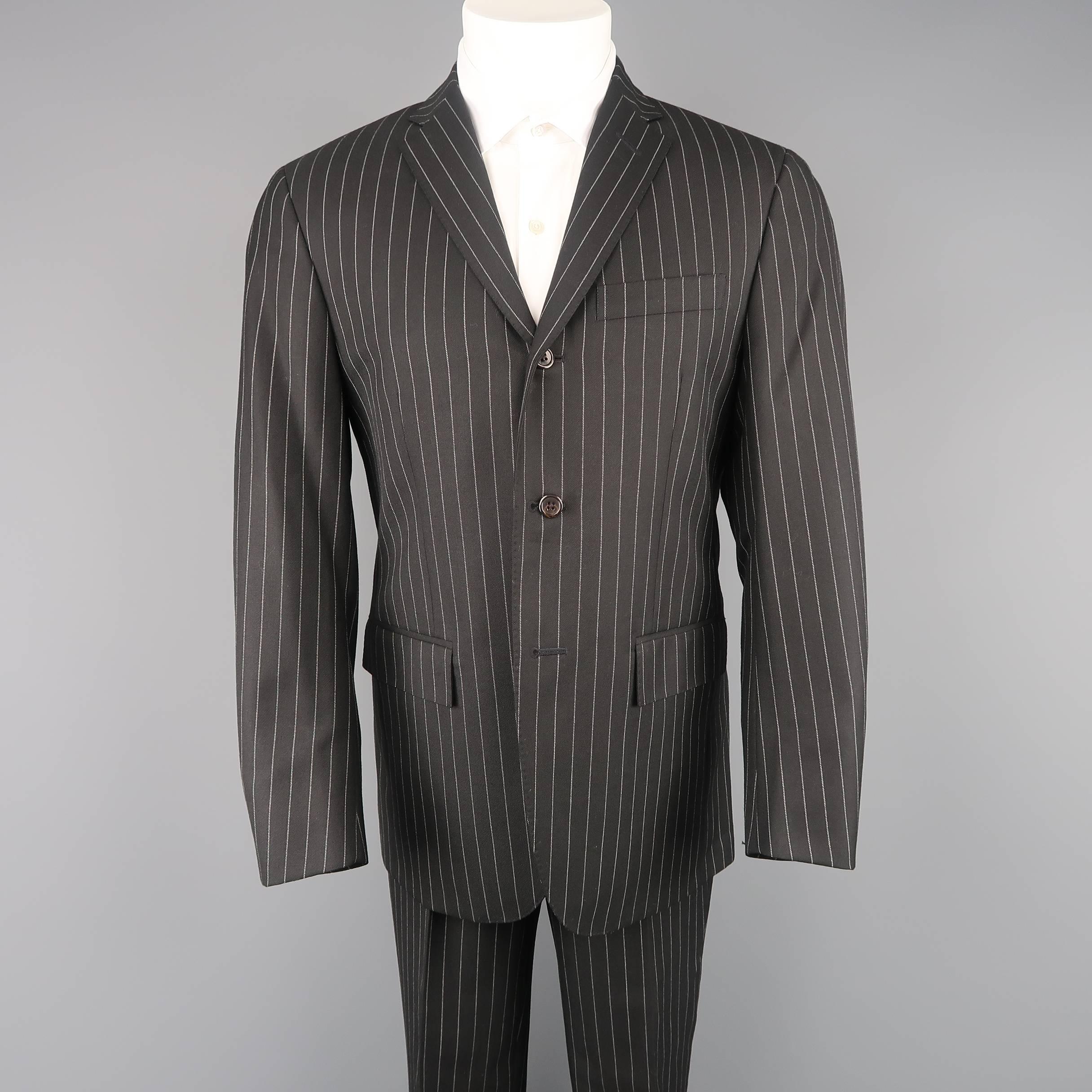 Polo Ralph Lauren  - Congressman two piece suit comes in black chalk stripe wool twill and includes a single breasted, three button sport coat with notch lapel and matching flat front dress pants. Made in Italy.
 
Excellent Pre-Owned