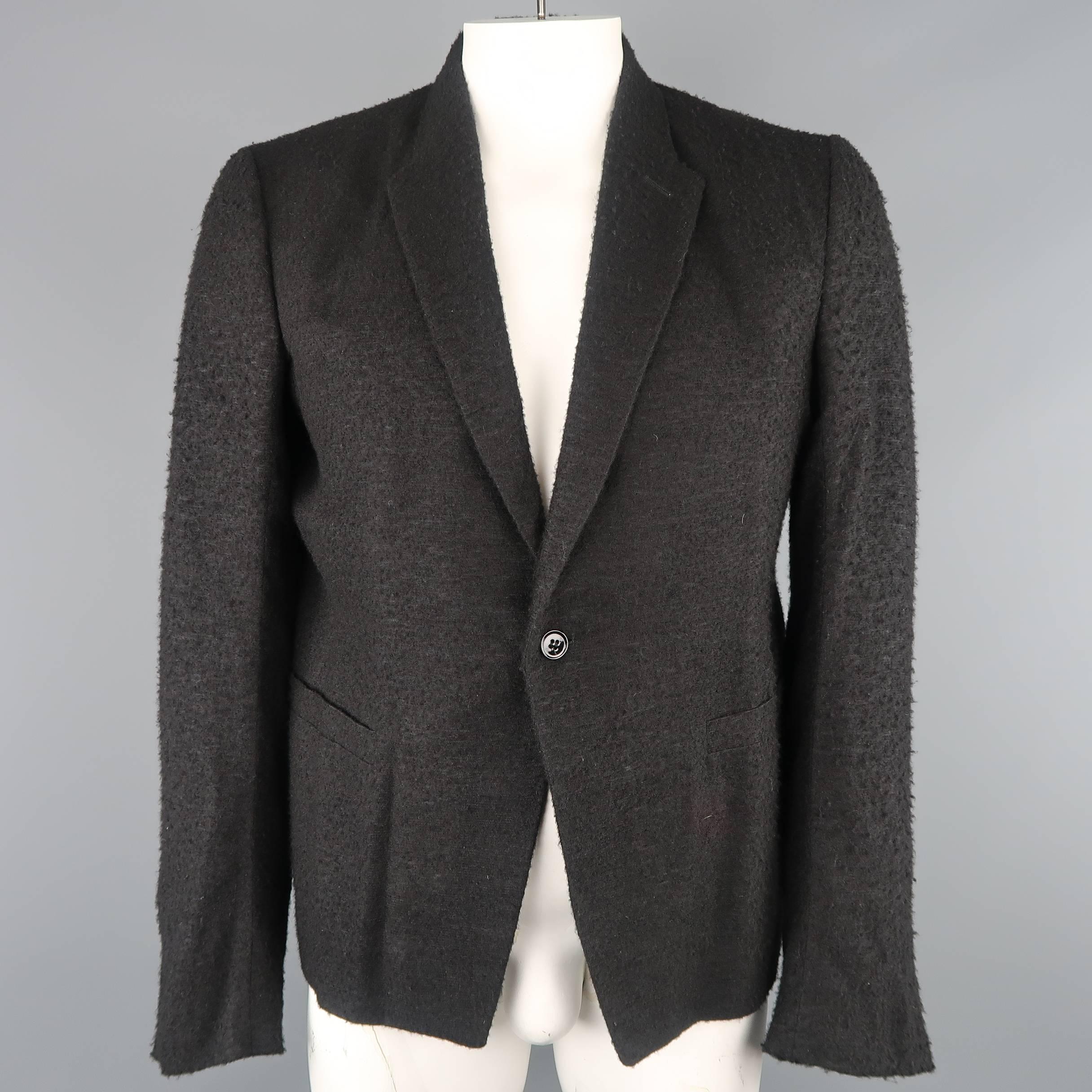 RICK OWENS F/W 2012/13 jacket comes in a pilled textured cashmere blend material with a notch lapel, single button closure, functional button cuffs, and belted waist. Made in Italy.
 
Good Pre-Owned Condition.
Marked: USA 46
 
Measurements:
