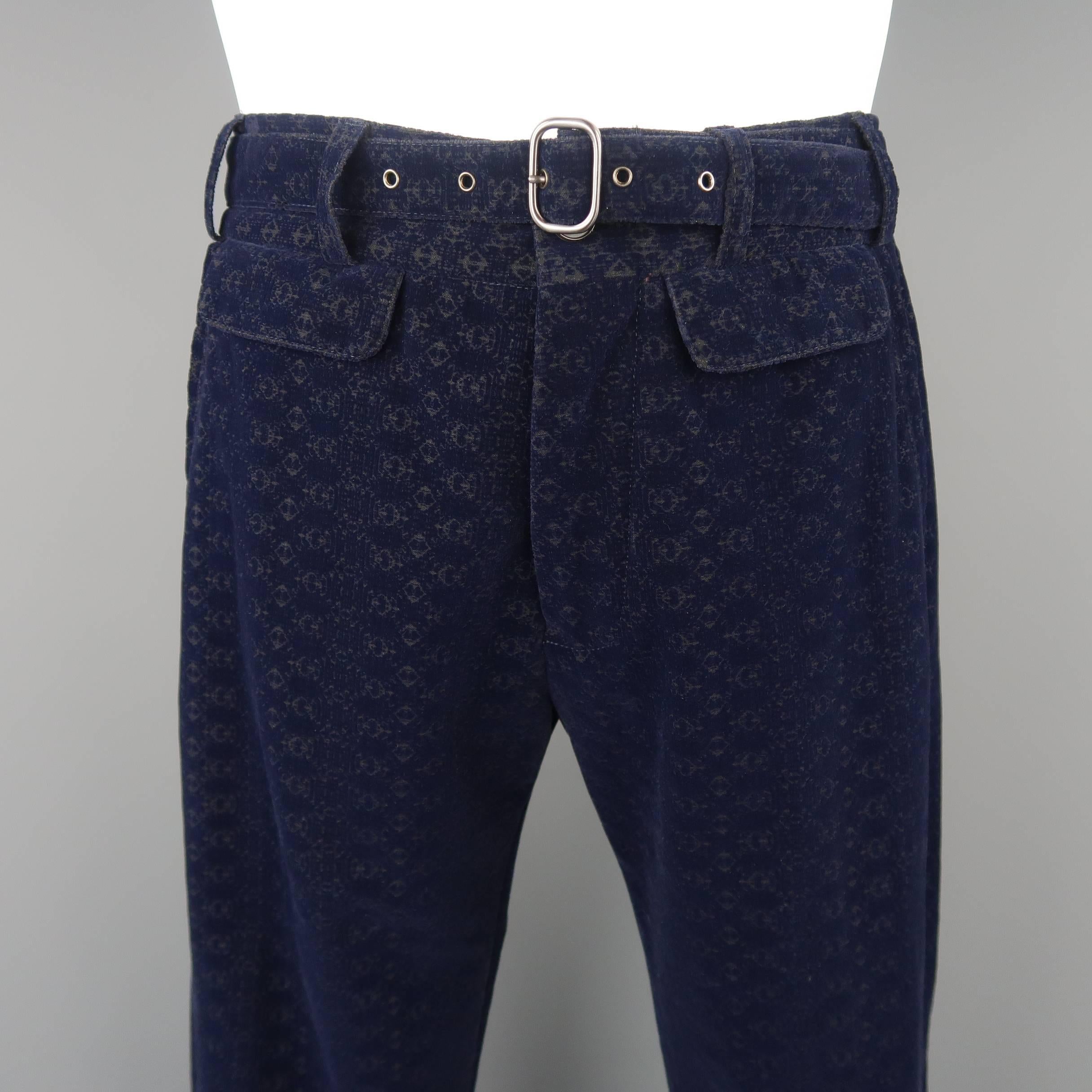 ROBERTO CAVALLI dress pants come in a navy blue velvet with all over print and features slated and double flap pockets and a belted waistband. Made in Italy.
 
Good Pre-Owned Condition.
Marked: IT 48
 
Measurements:
 
Waist: 32.5 in.
Rise:  10