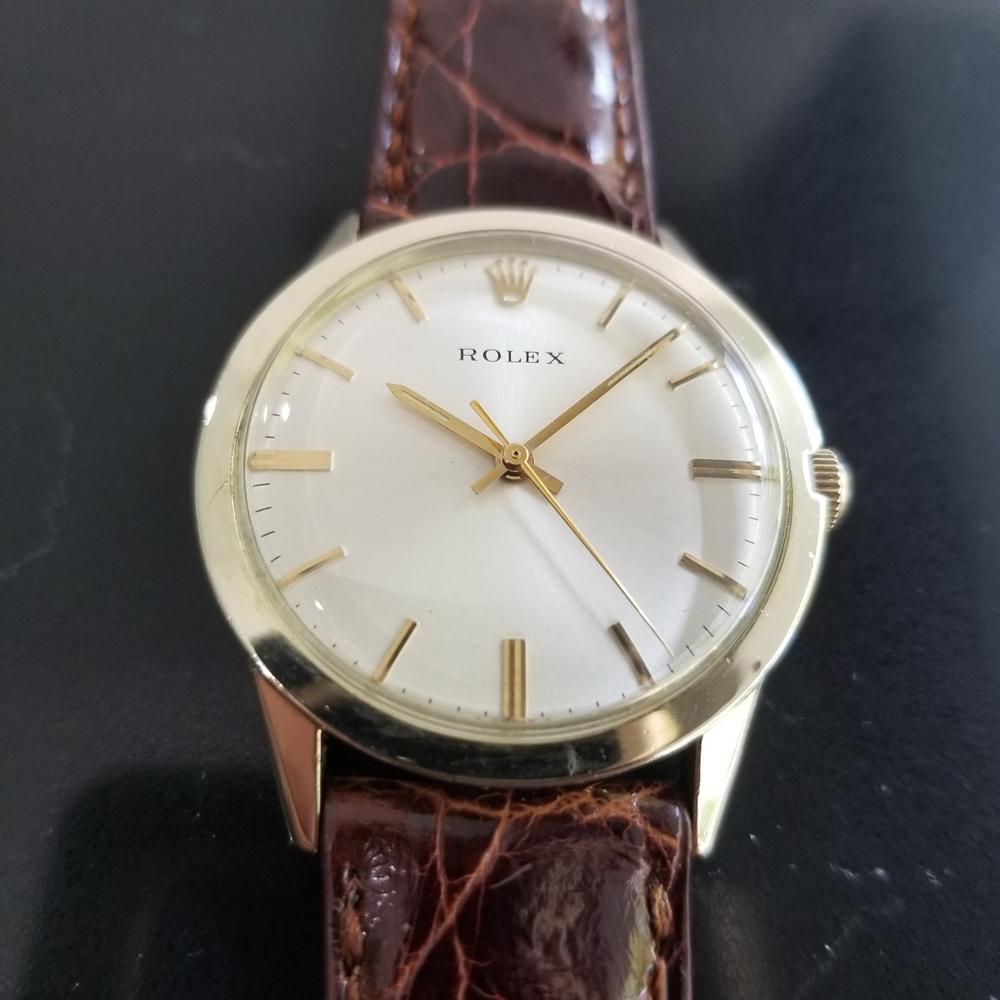 Classic luxury, Men's Rolex Presentation ref.7002 automatic 14k gold-filled dress watch, c.1971 with original box and paper. Verified authentic by a master watchmaker. Gorgeous Rolex signed dial, applied indice hour markers, gilt minute and hour