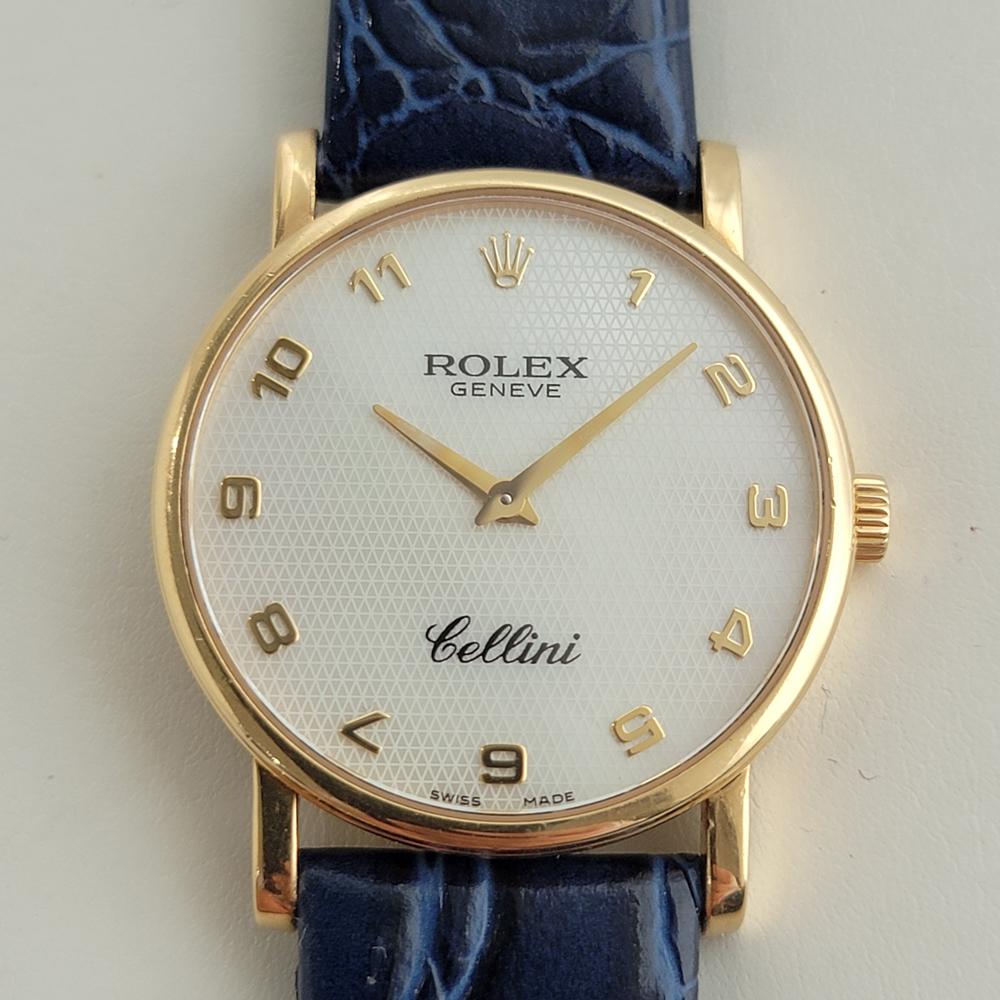Timeless luxury, Men's Rolex Cellini Geneve 18k solid gold manual wind dress watch, c.2000s, in excellent condition. Verified authentic by a master watchmaker. Gorgeous Rolex signed textured dial, Geneve hallmarked, applied Roman numeral hour
