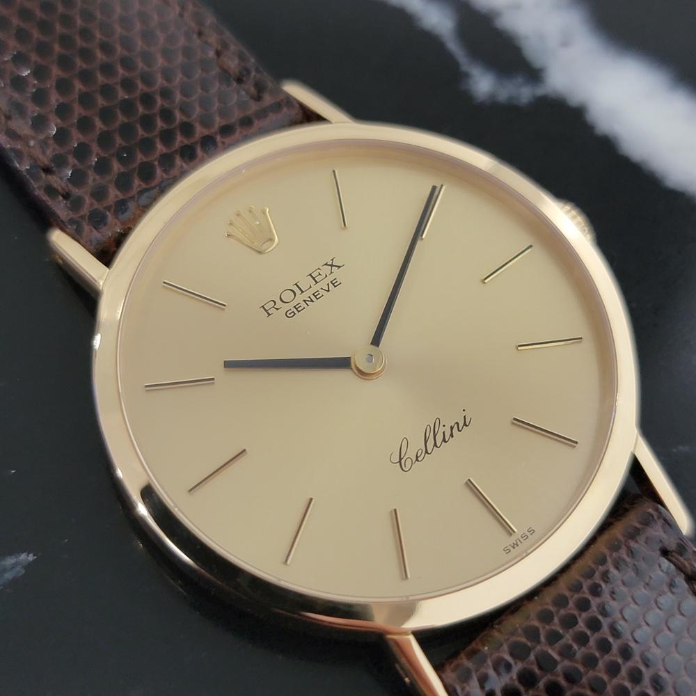 Elegant luxury, Men's 18k solid gold Rolex Cellini 4112 hand-wind dress watch, c.1976. Verified authentic by a master watchmaker. Gorgeous Rolex signed gold dial, applied gold indice hour markers, black minute and hour hands, hands and dial in