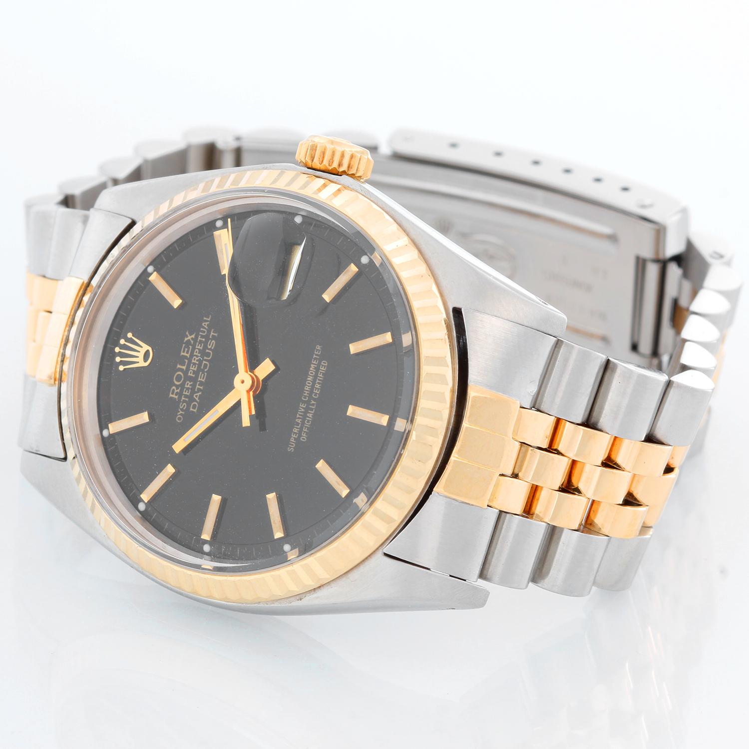 Men's Rolex Datejust 2-Tone Watch 1601 - Automatic winding, 27 jewels, Quickset, acrylic crystal. Stainless steel and 18k yellow gold fluted bezel ( 36 mm ). Black dial. Two tone jubilee bracelet . Pre-owned with custom box. 