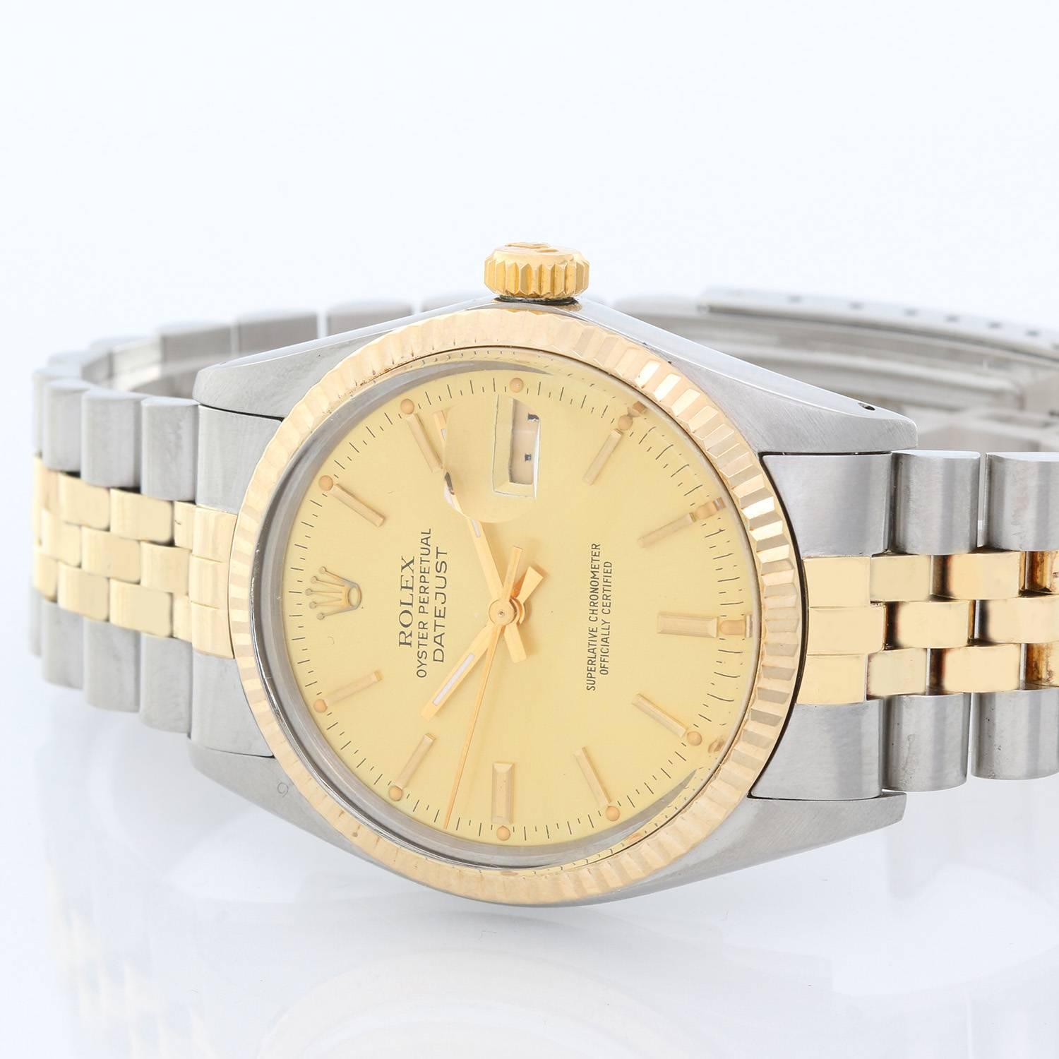 Men's Rolex Datejust 2-Tone Watch 16013 -  Automatic winding, 27 jewels, Quickset, acrylic crystal. Stainless steel and 18k yellow gold fluted bezel  (36mm diameter). Champagne dial with stick markers. Stainless steel and 18k yellow gold Jubilee
